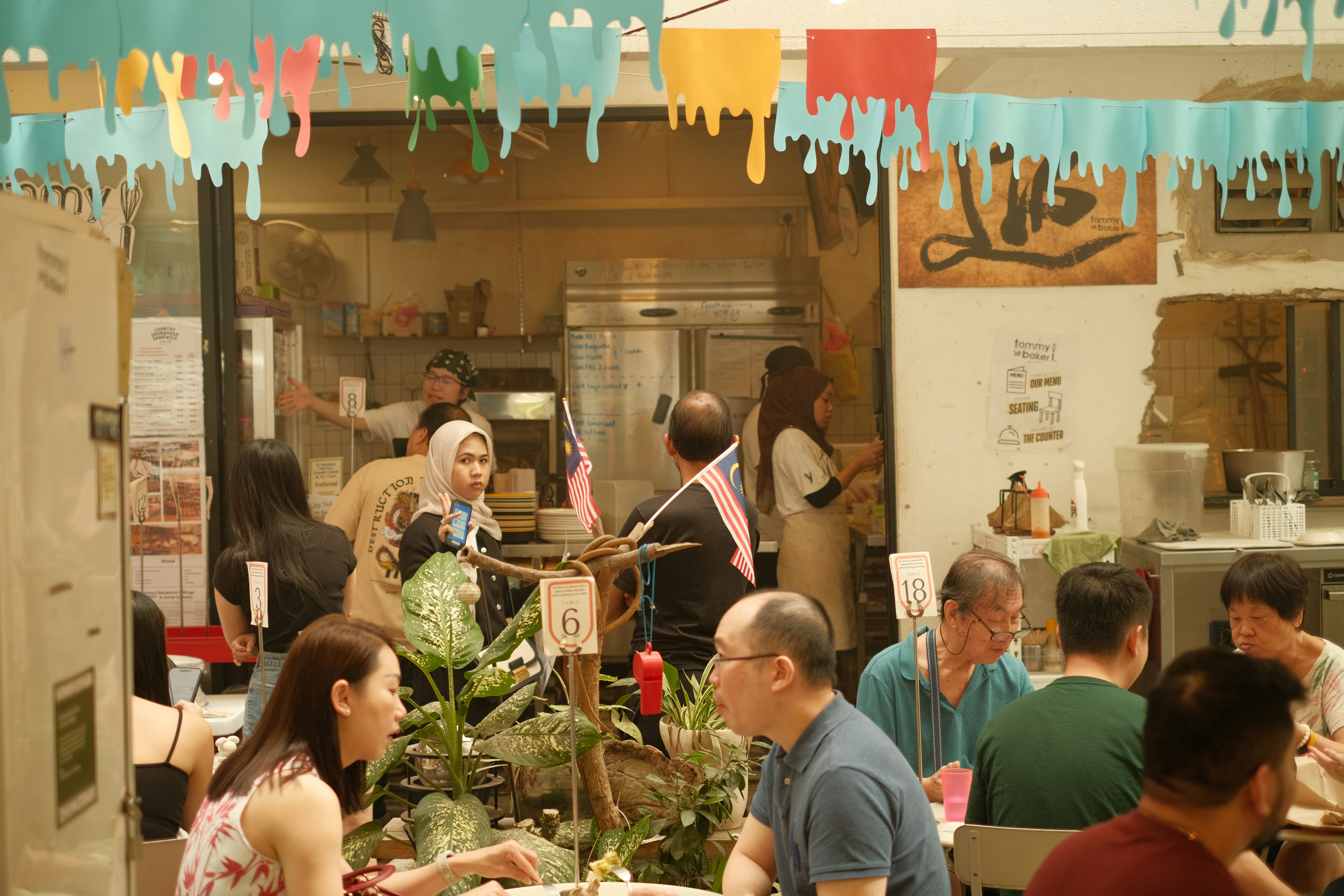 A group of people sitting around a table