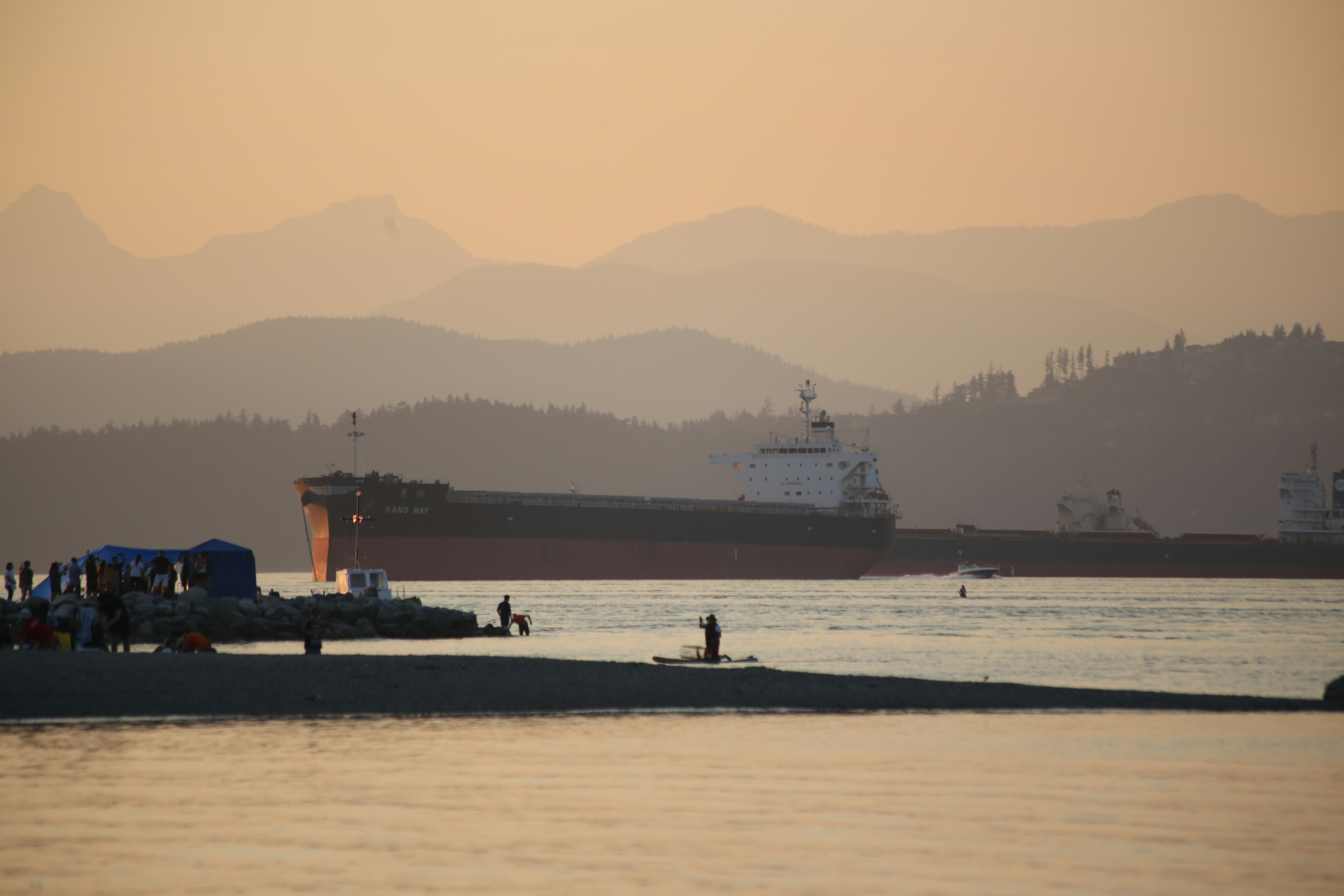A body of water with a boat in the distance