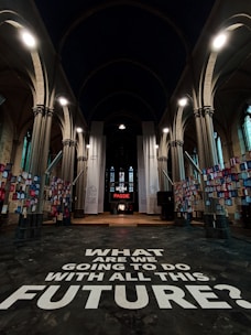 A large room with a sign that says, what are we doing today?