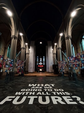 A large room with a sign that says, what are we doing today?
