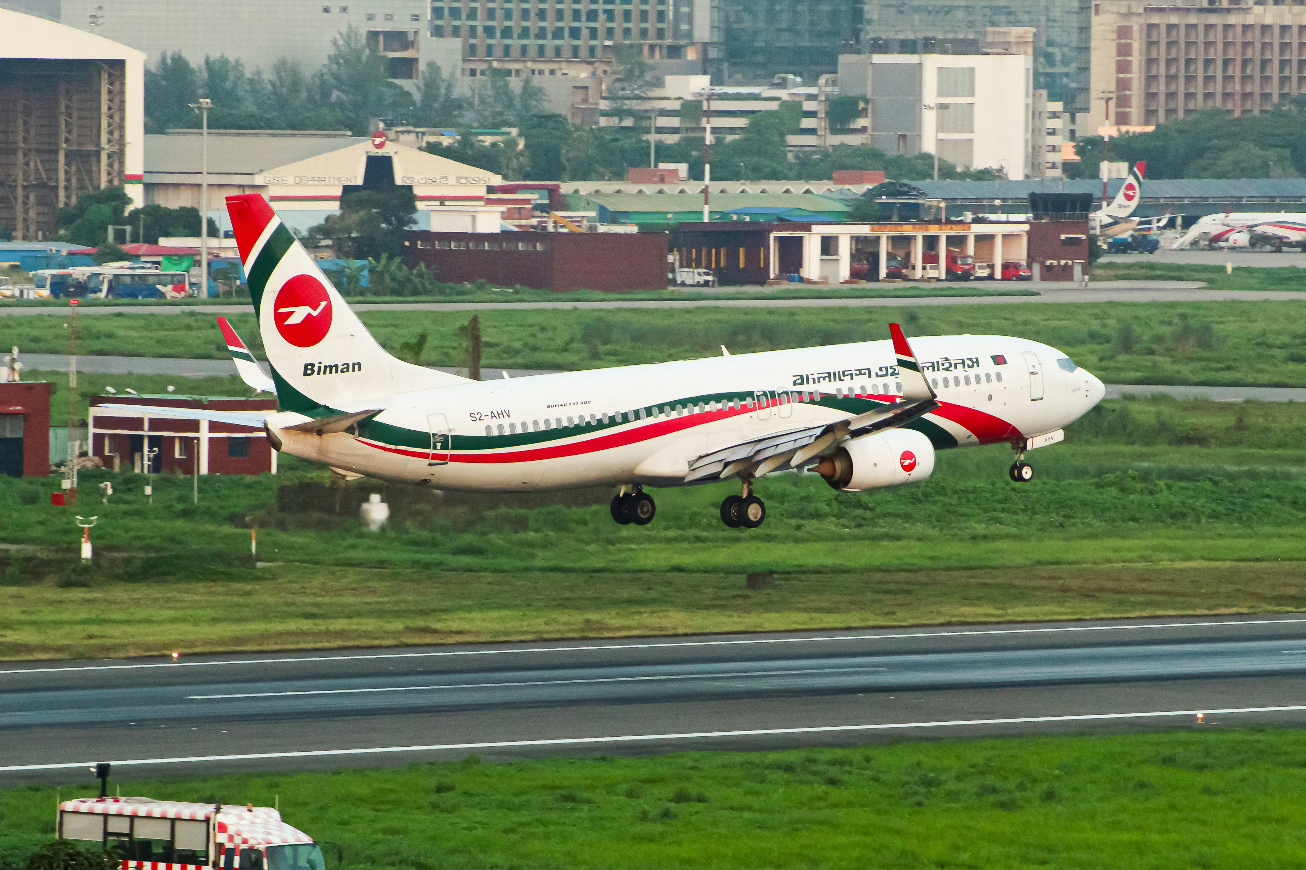 A large jetliner taking off from an airport runway