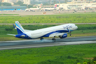 A large jetliner taking off from an airport runway