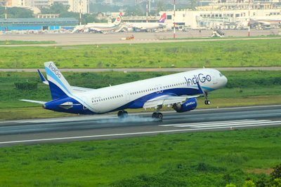 A large jetliner taking off from an airport runway