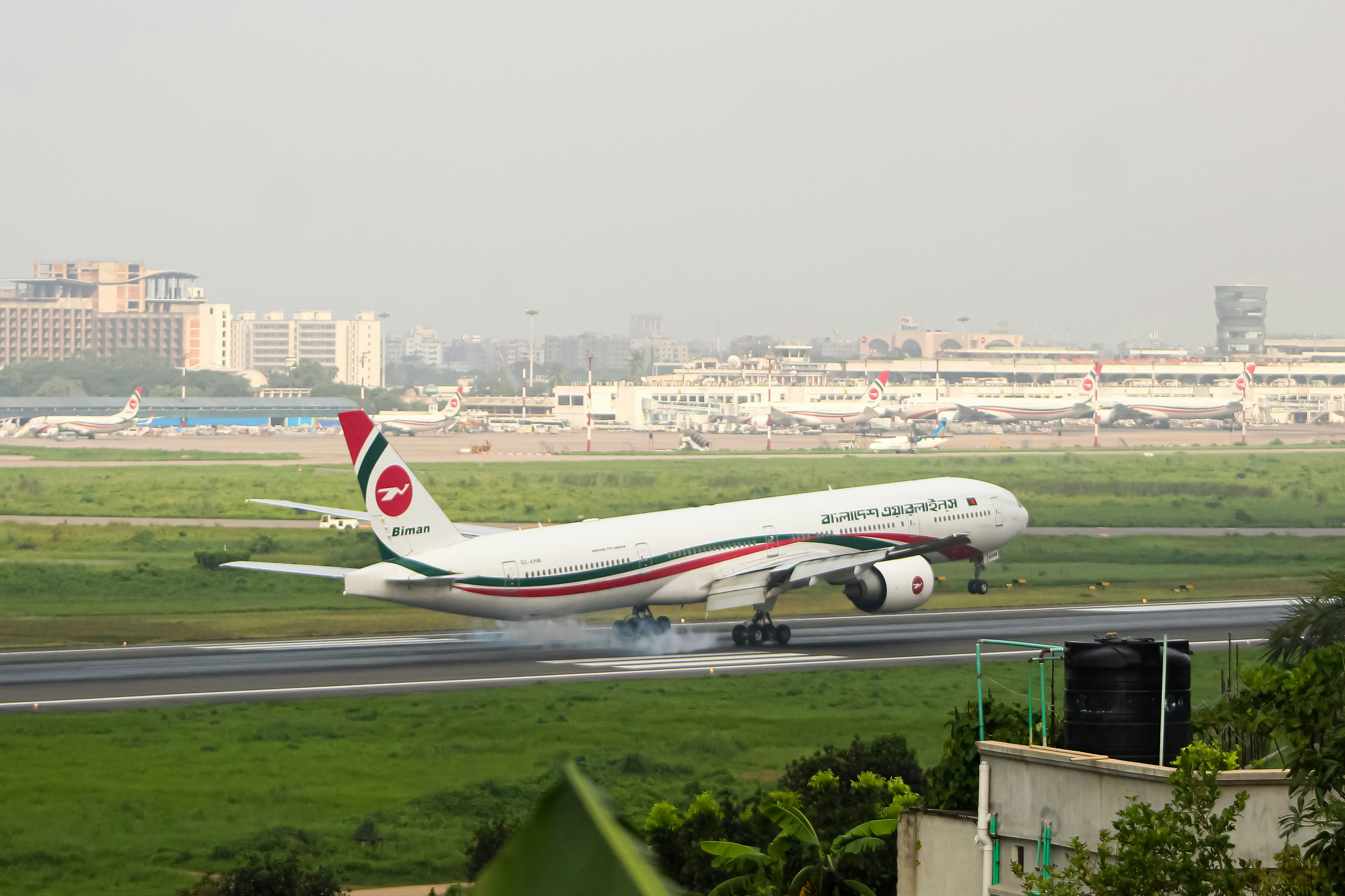 A large jetliner taking off from an airport runway