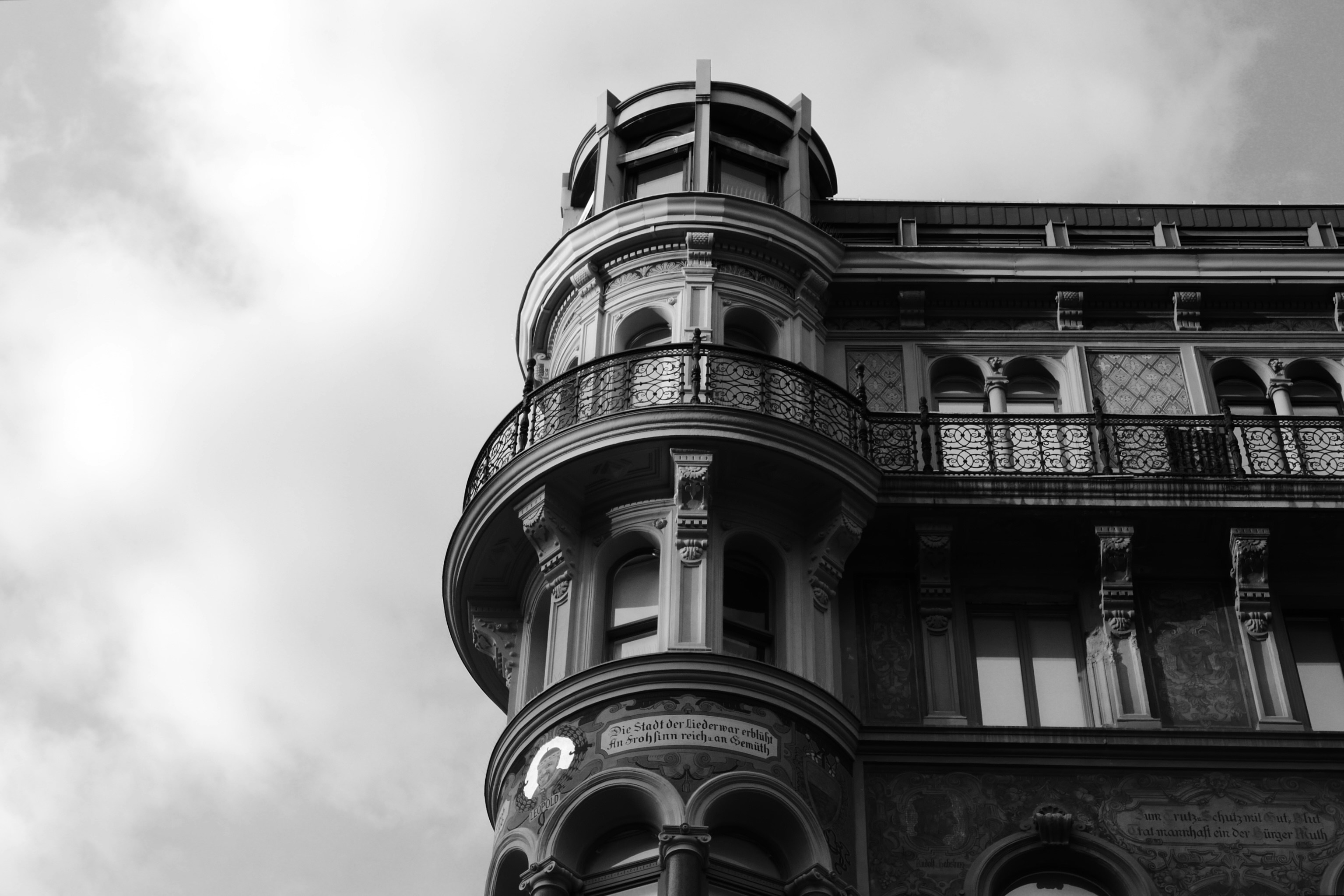 A black and white photo of a tall building