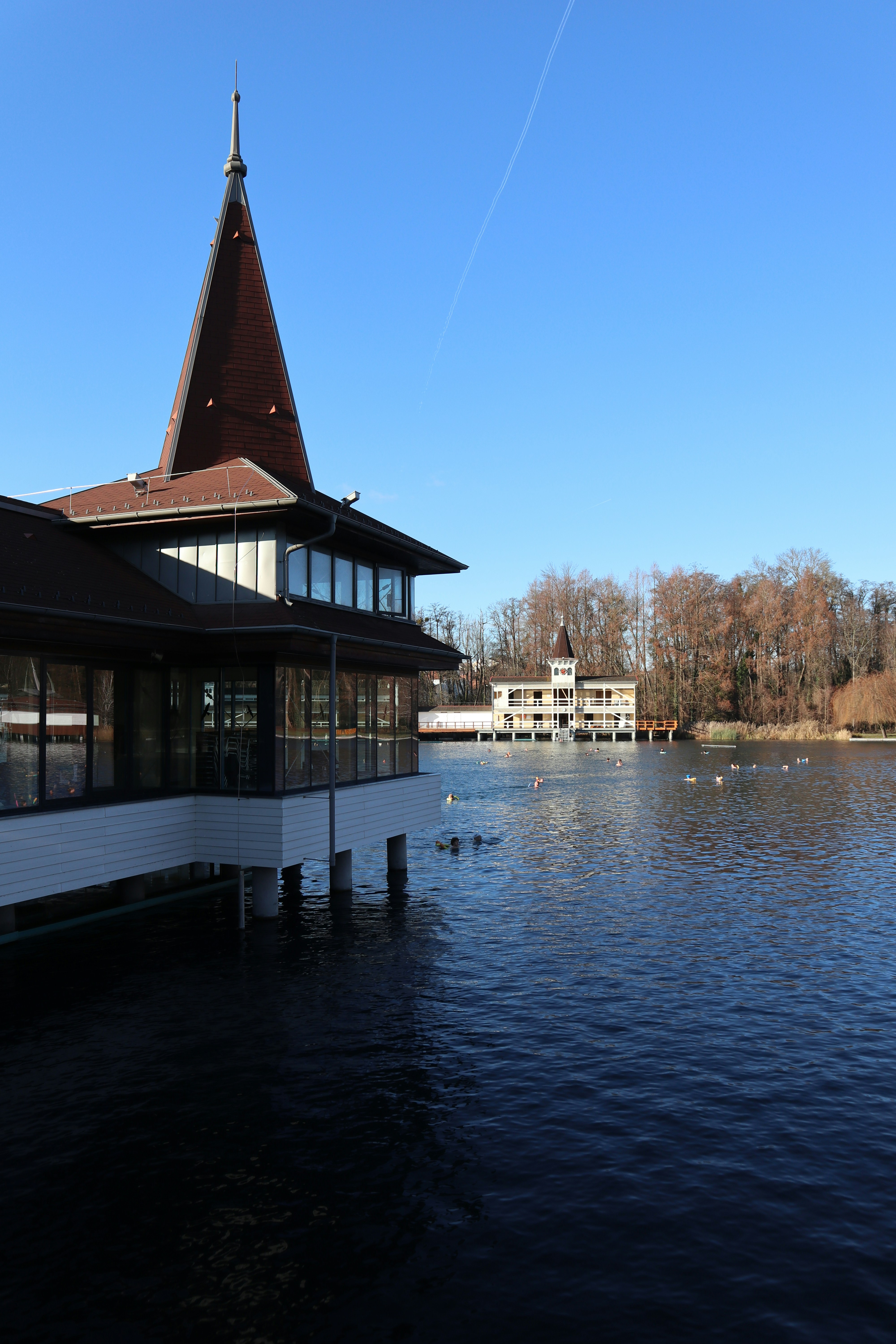 A large body of water next to a building