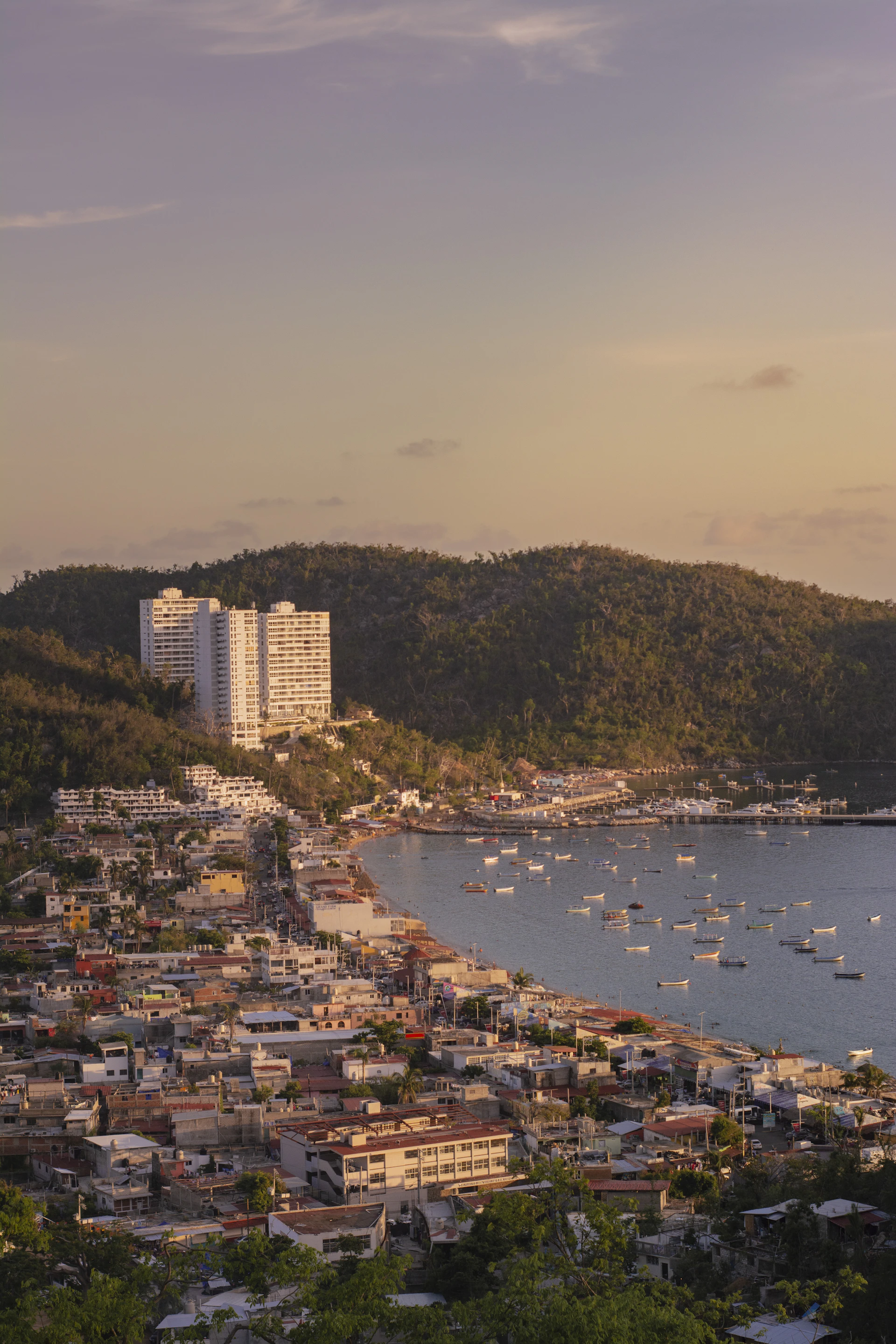 A large body of water surrounded by a city