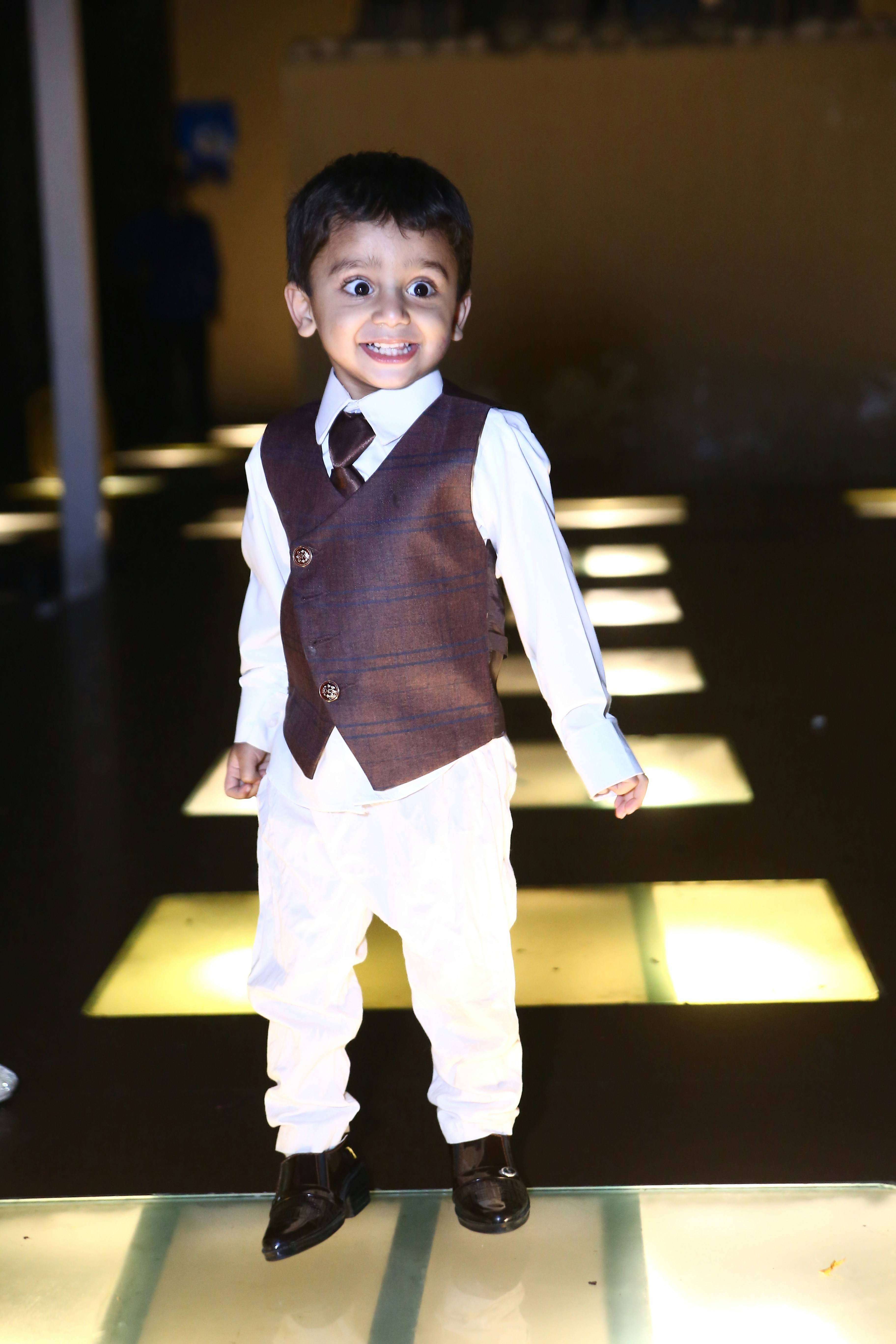 woman wearing yellow long-sleeved dress under white clouds and blue sky during daytime