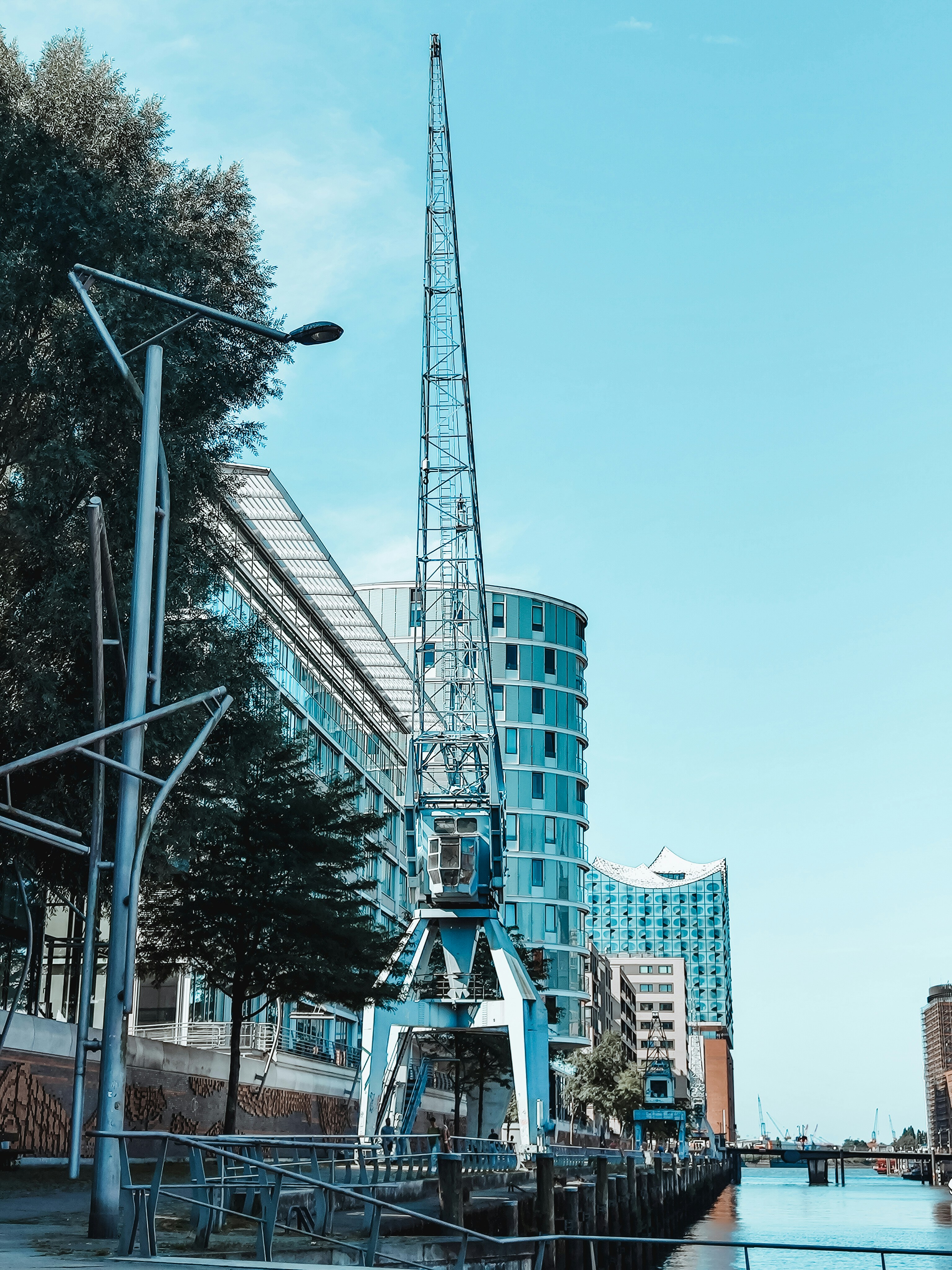 A tall tower sitting next to a body of water
