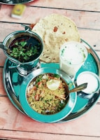 A plate of food on a wooden table