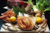A plate of seafood and vegetables on a table