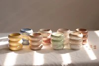 Finished stoneware bowls stacked on a shelf
