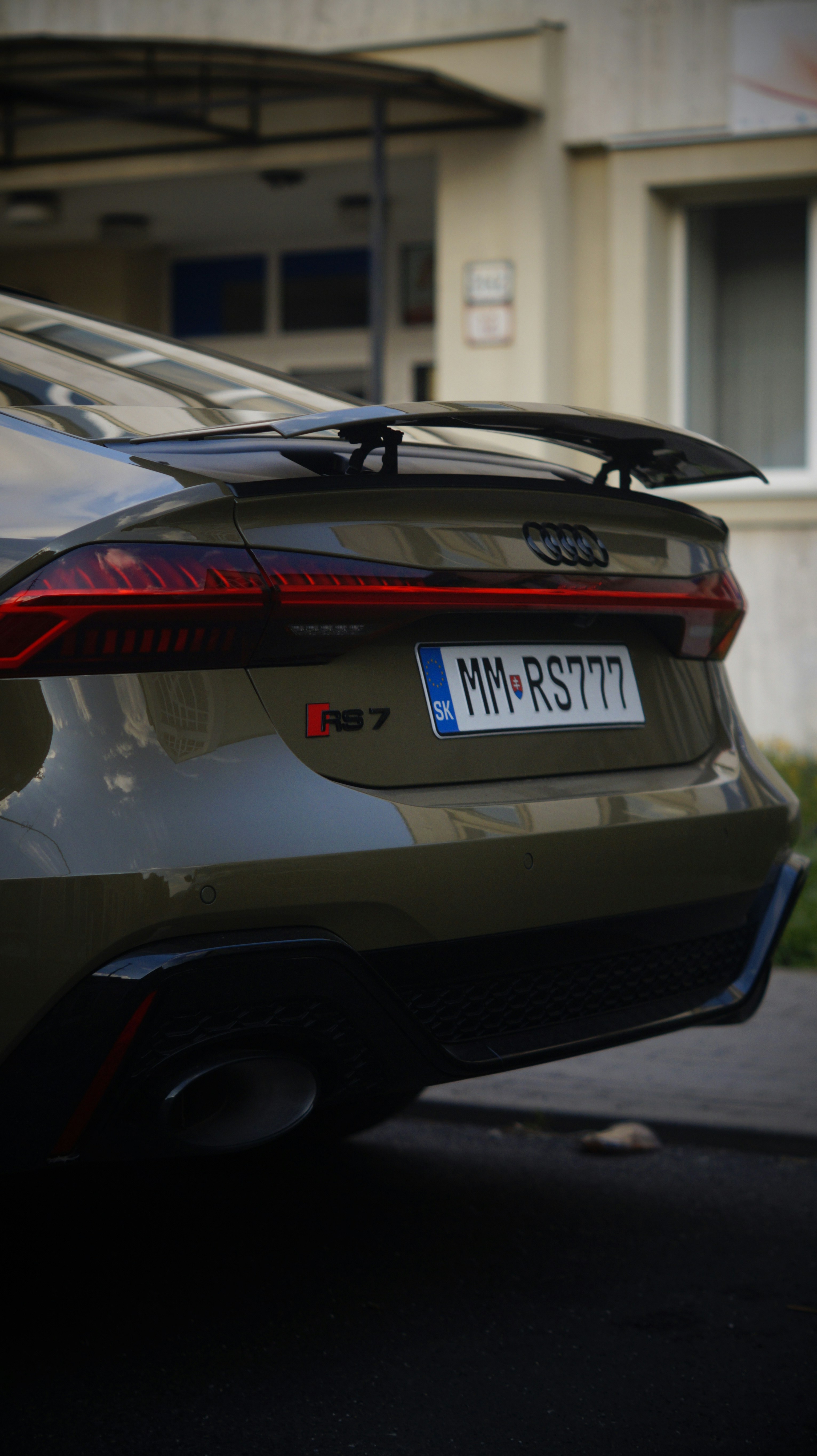 A car parked in front of a building
