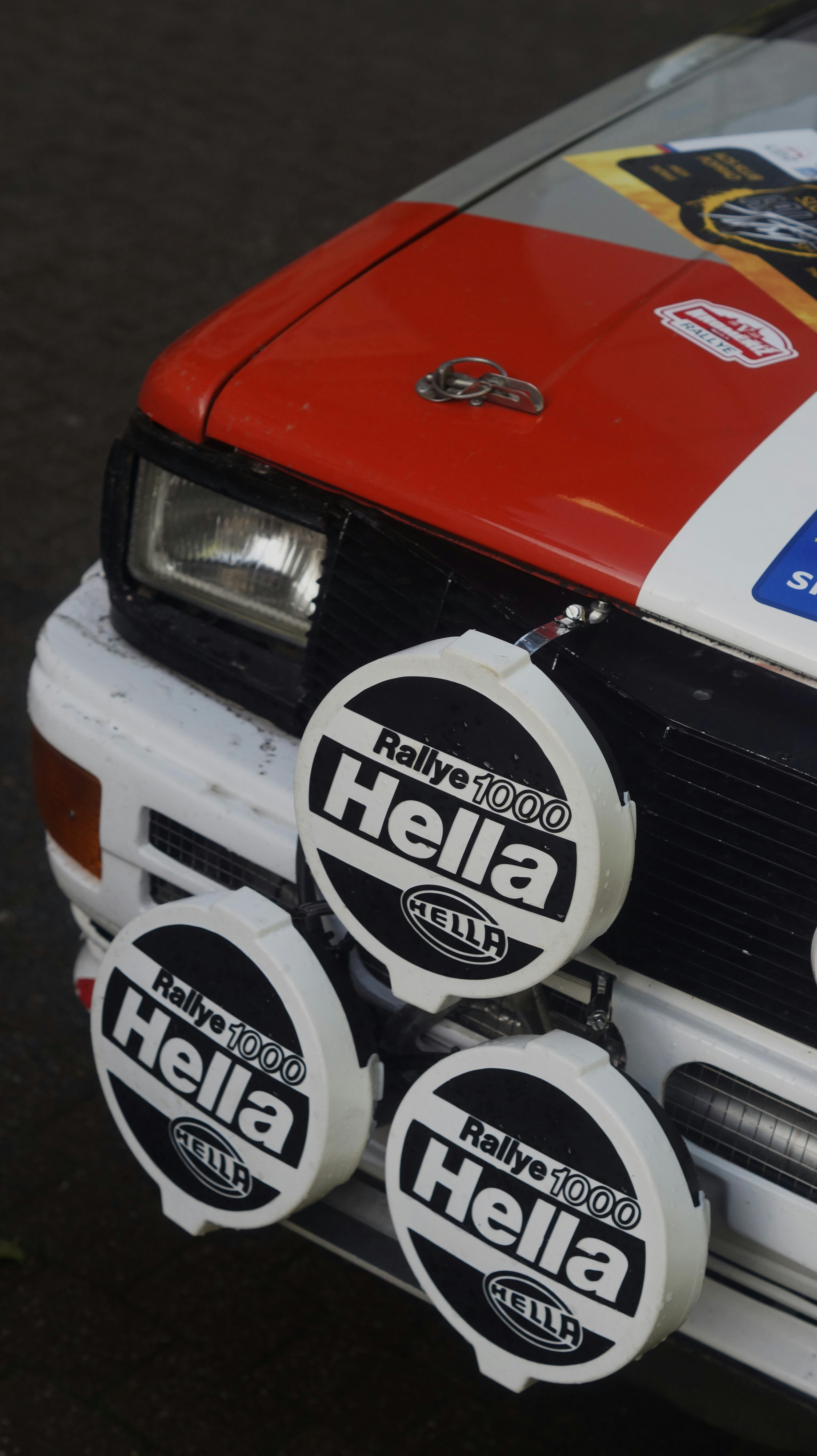 A close up of a car with stickers on it