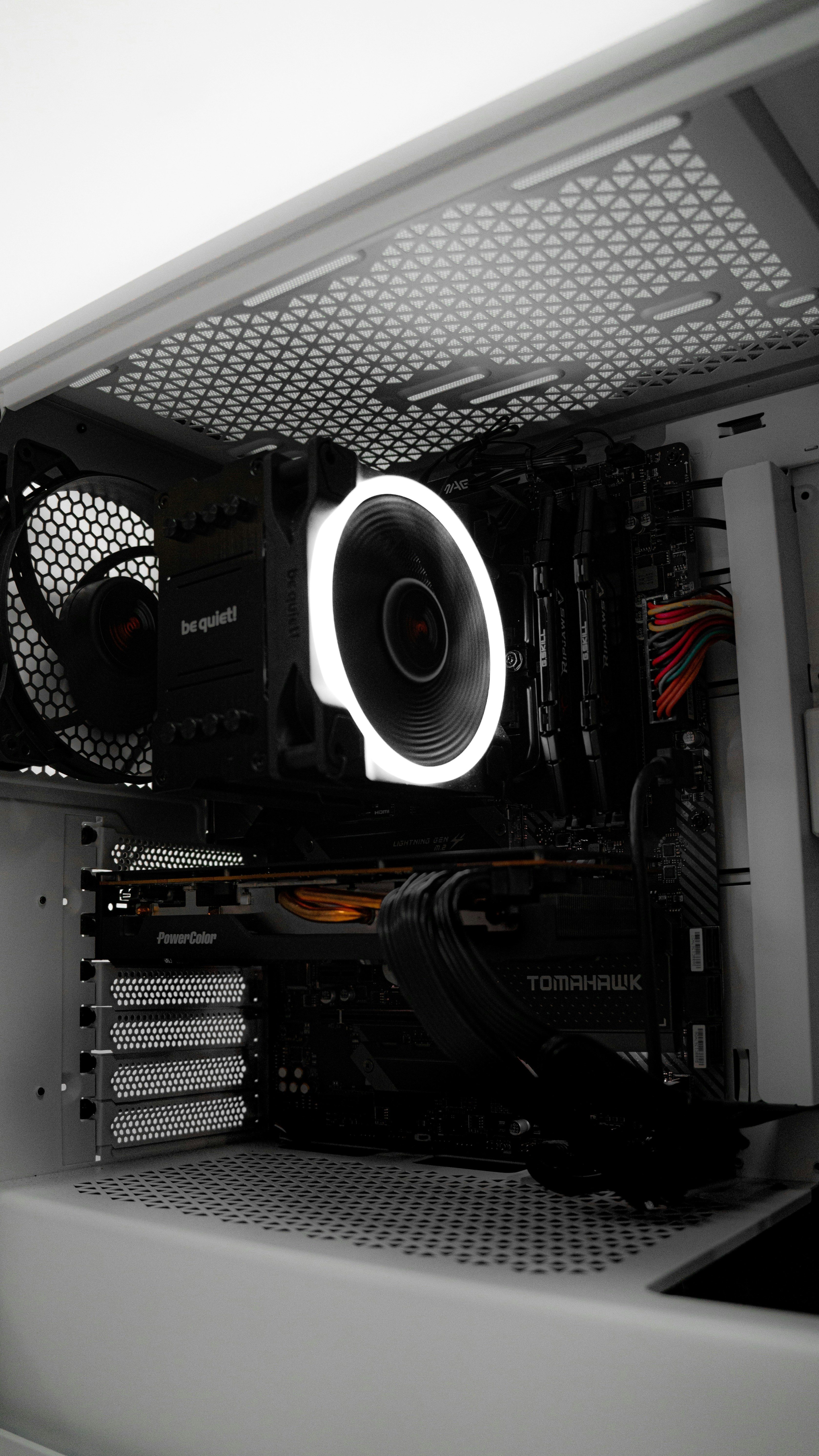 A close up of a computer case with a fan