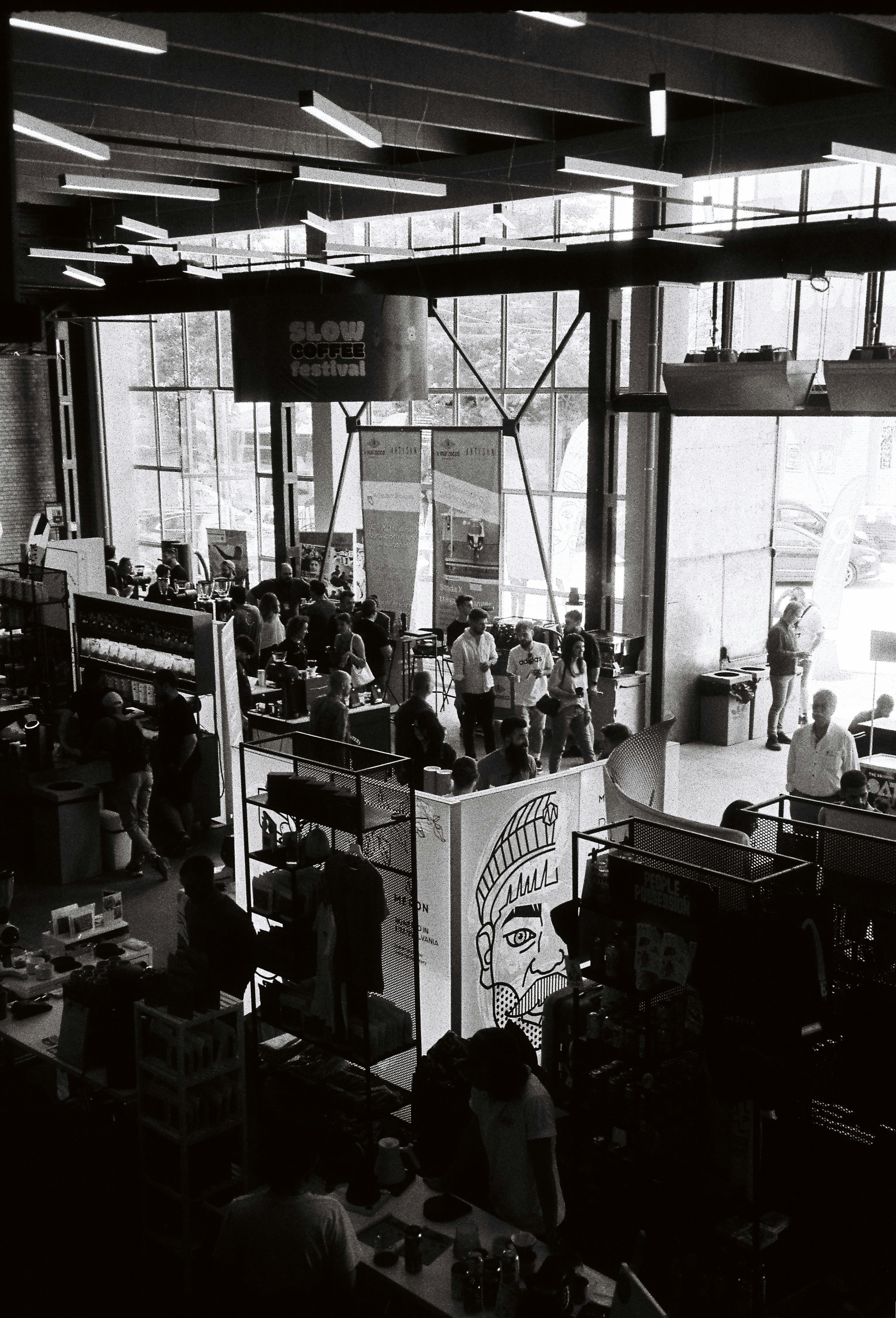 A black and white photo of people in a restaurant