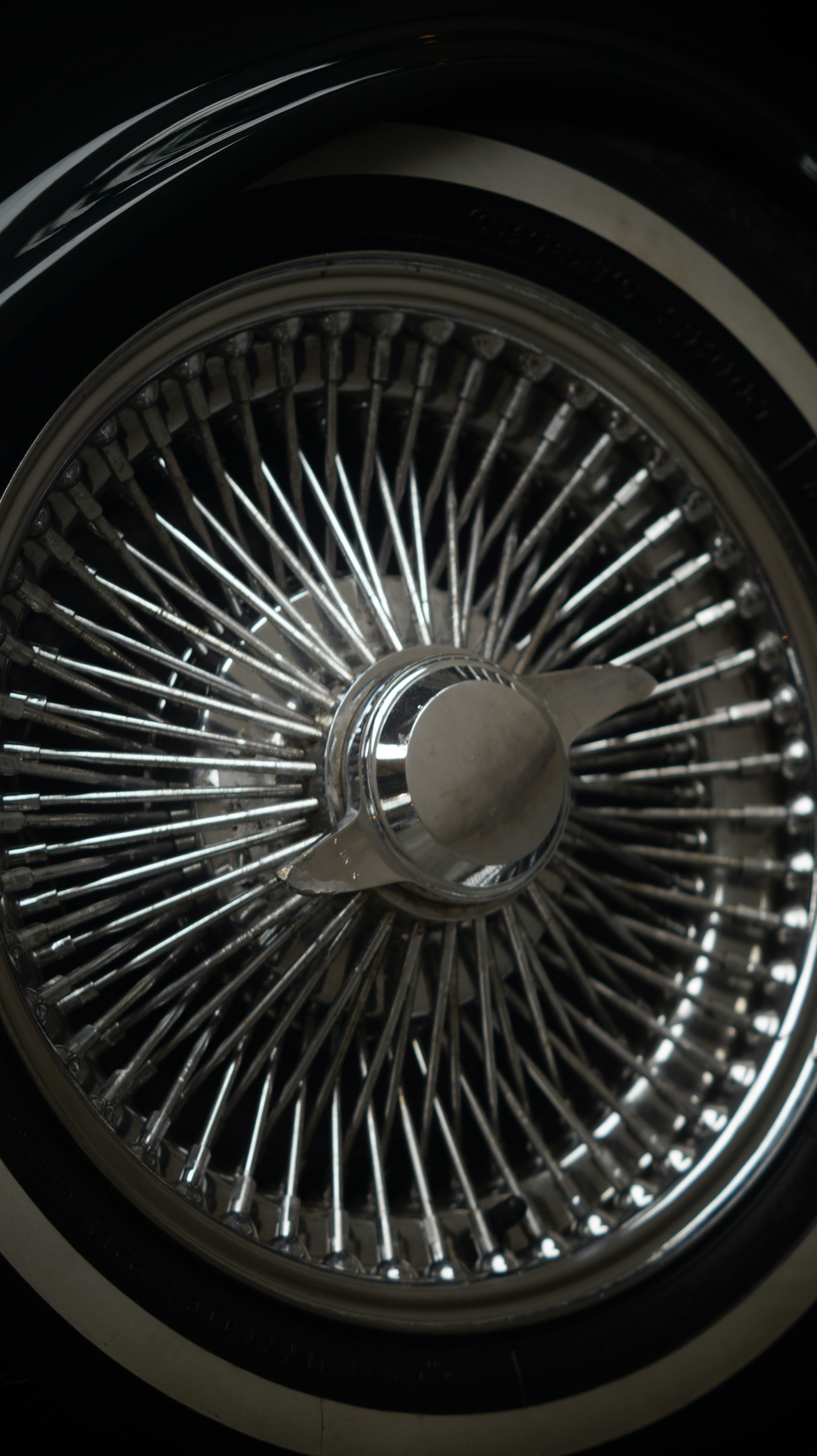 A close up of a tire on a car