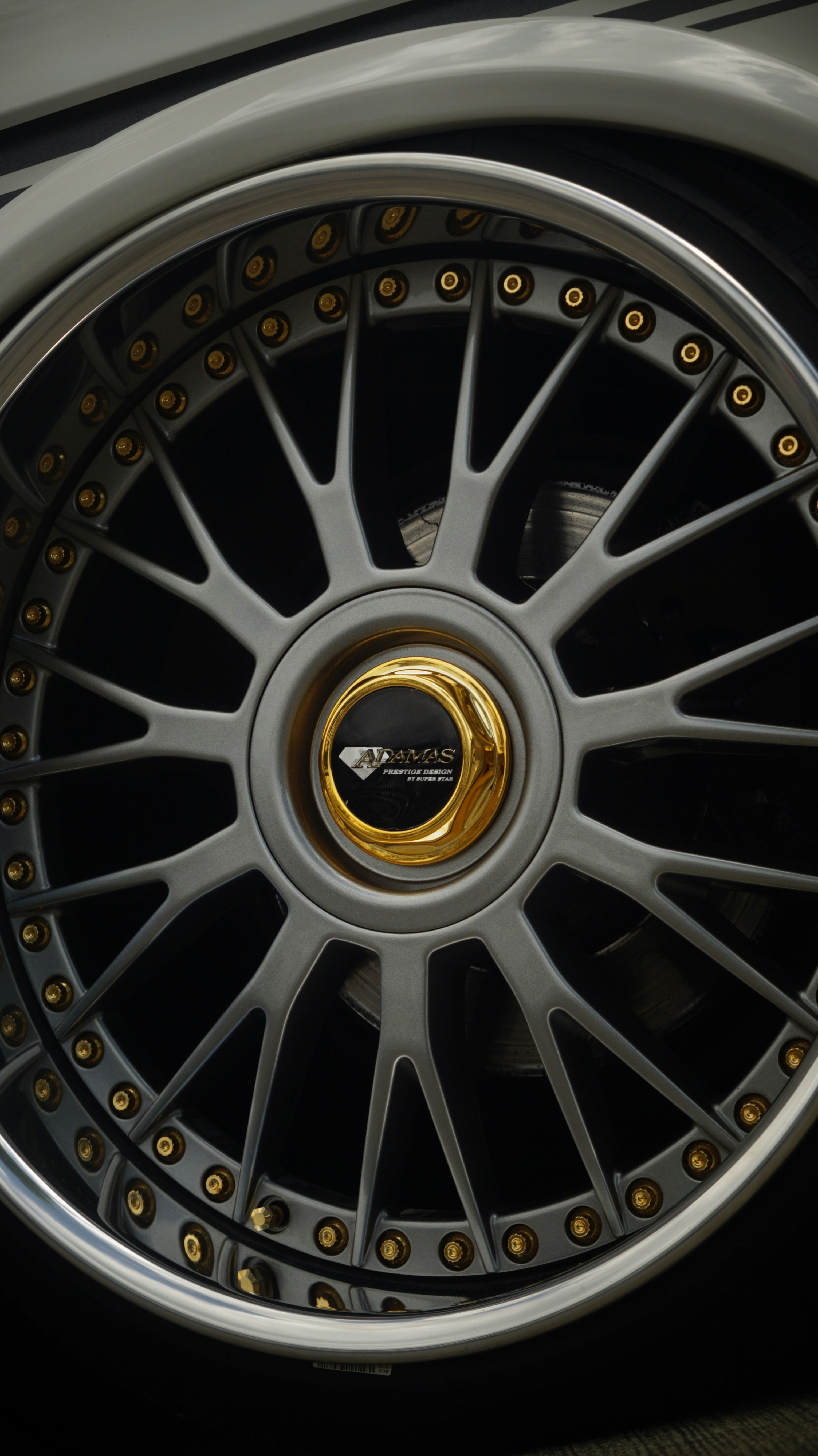 A close up of a wheel on a car