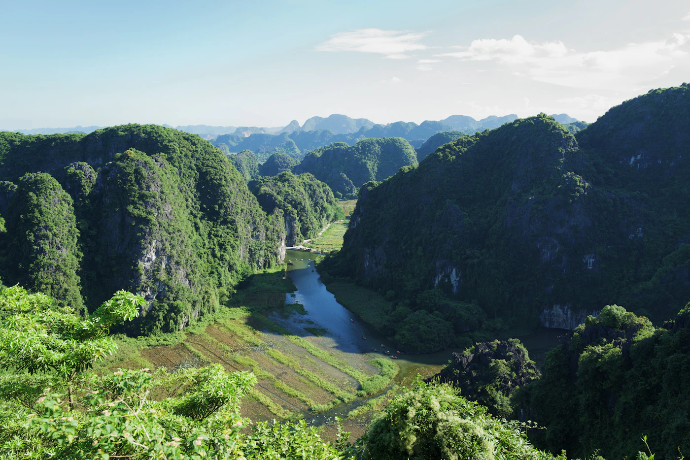 Ninh Bình river winding between green limestone hills