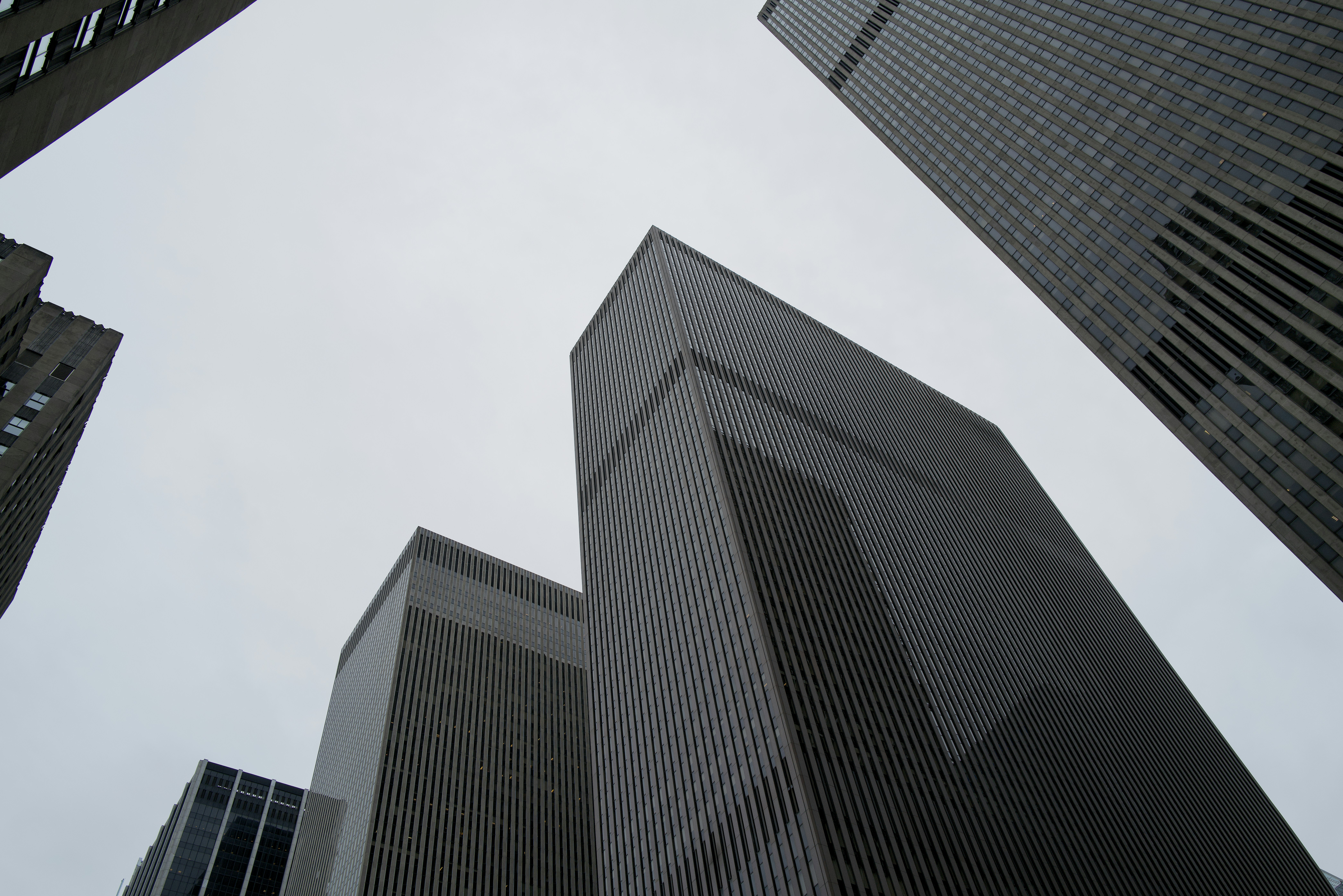 Looking up at tall buildings in a city