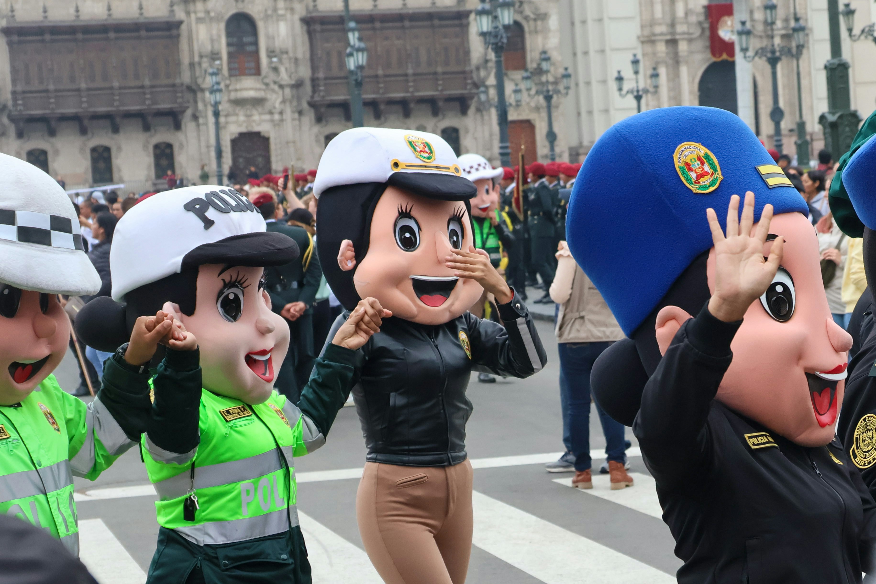 A group of people in costumes standing on a street
