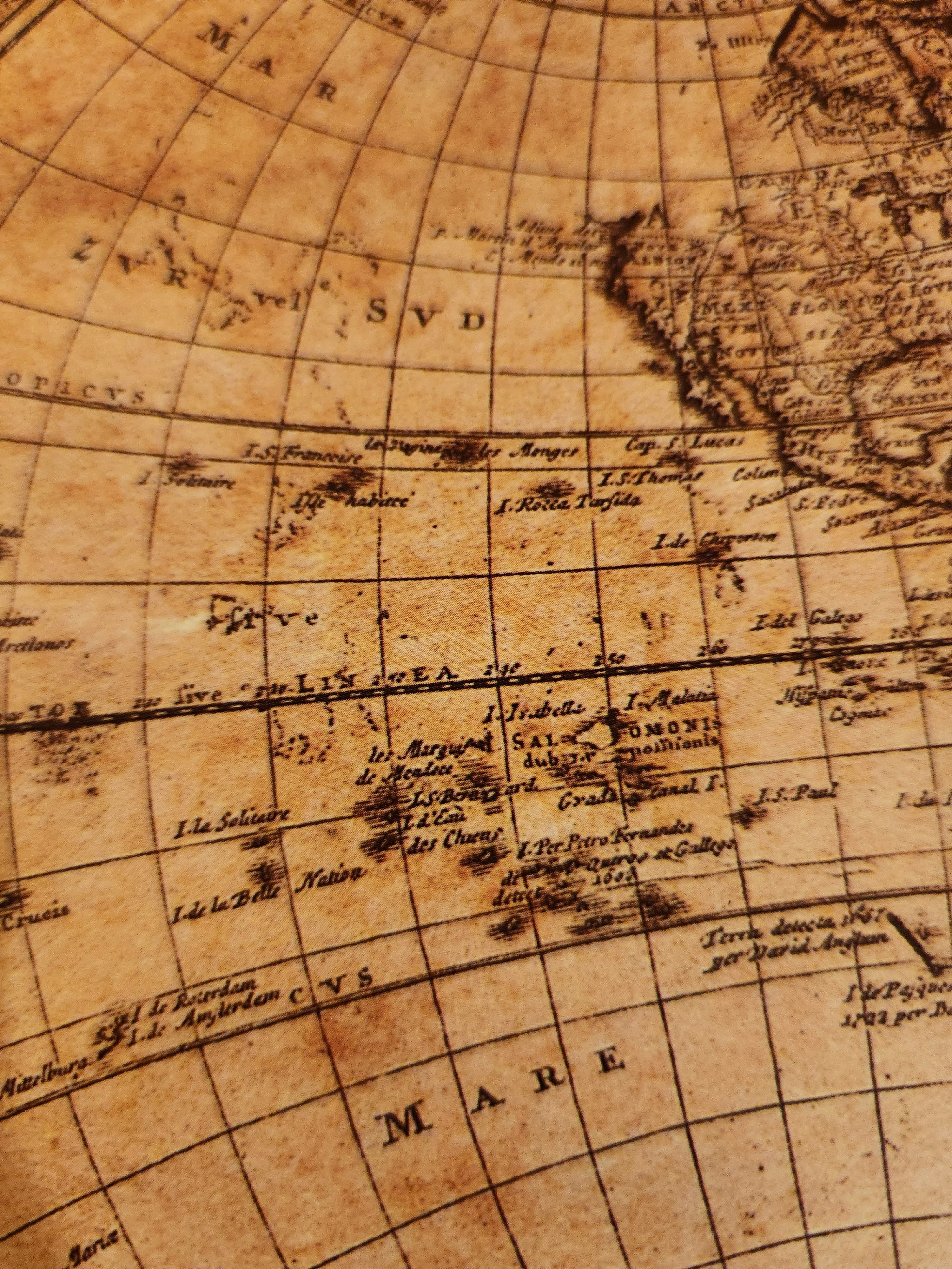 Vintage world map with compass and old parchment texture