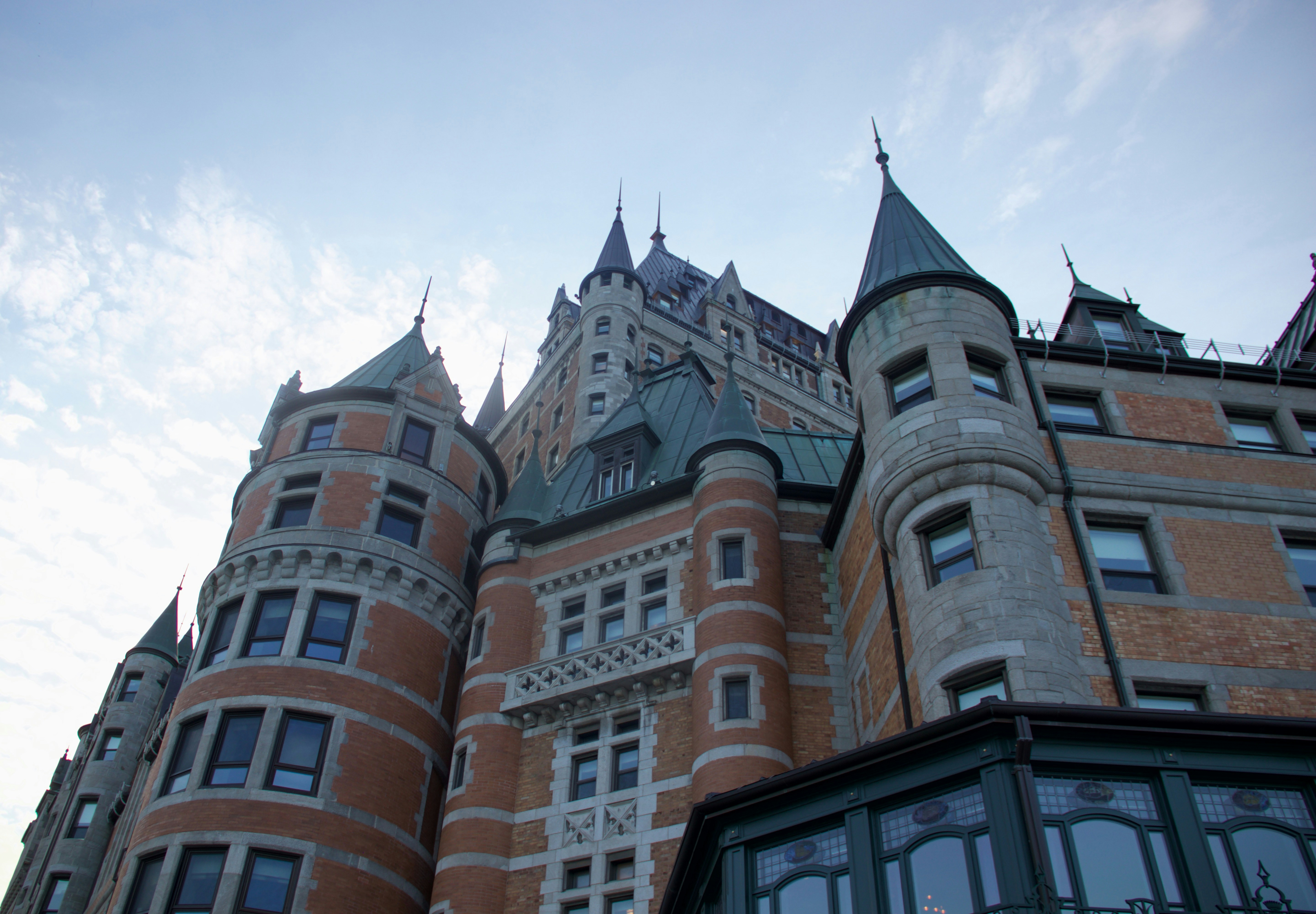 A large building with a clock on the front of it
