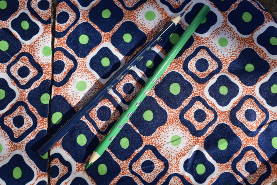 A close up of a blue and green patterned cloth