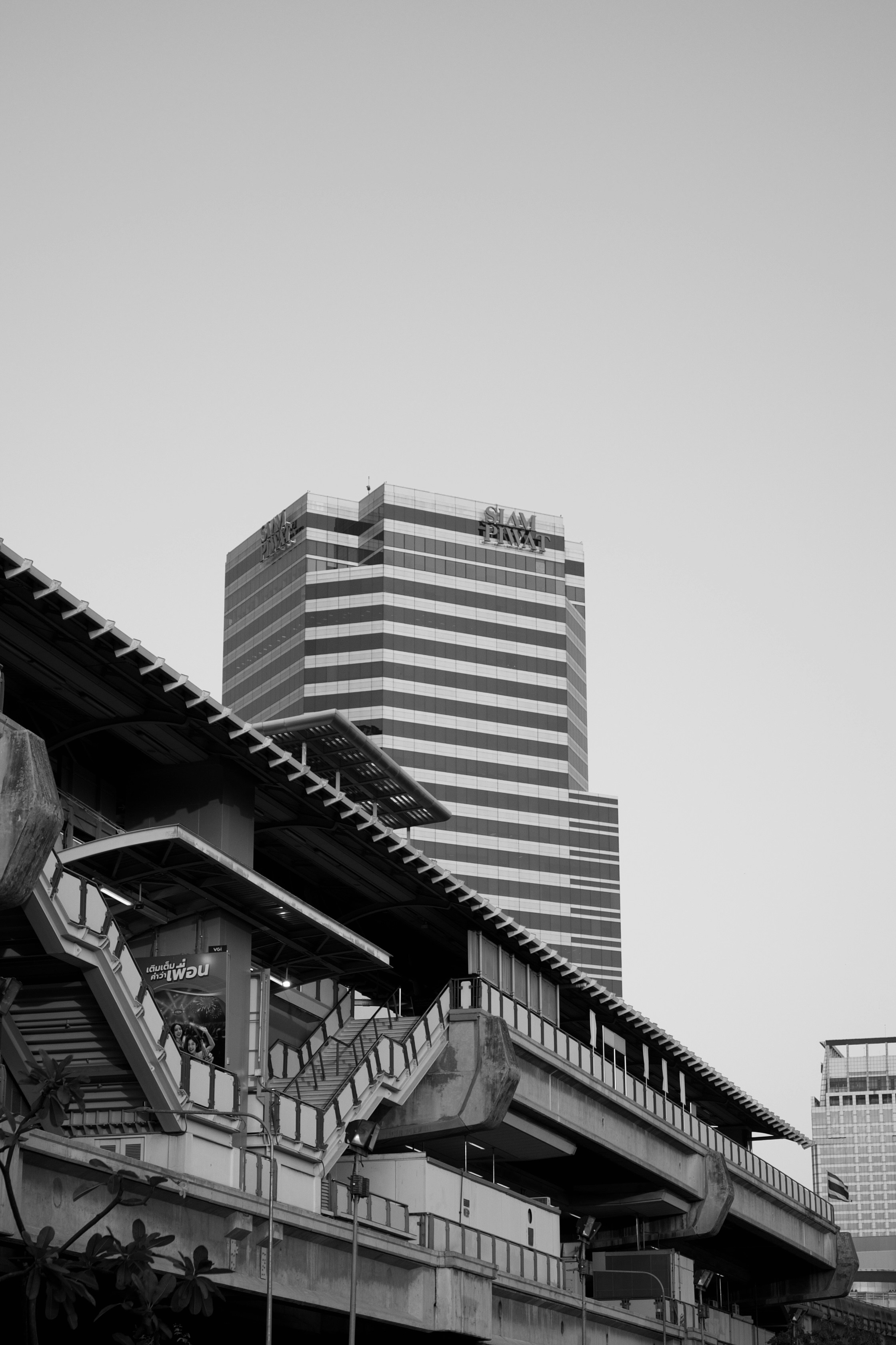 A black and white photo of a train station