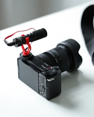 A camera sitting on top of a white table