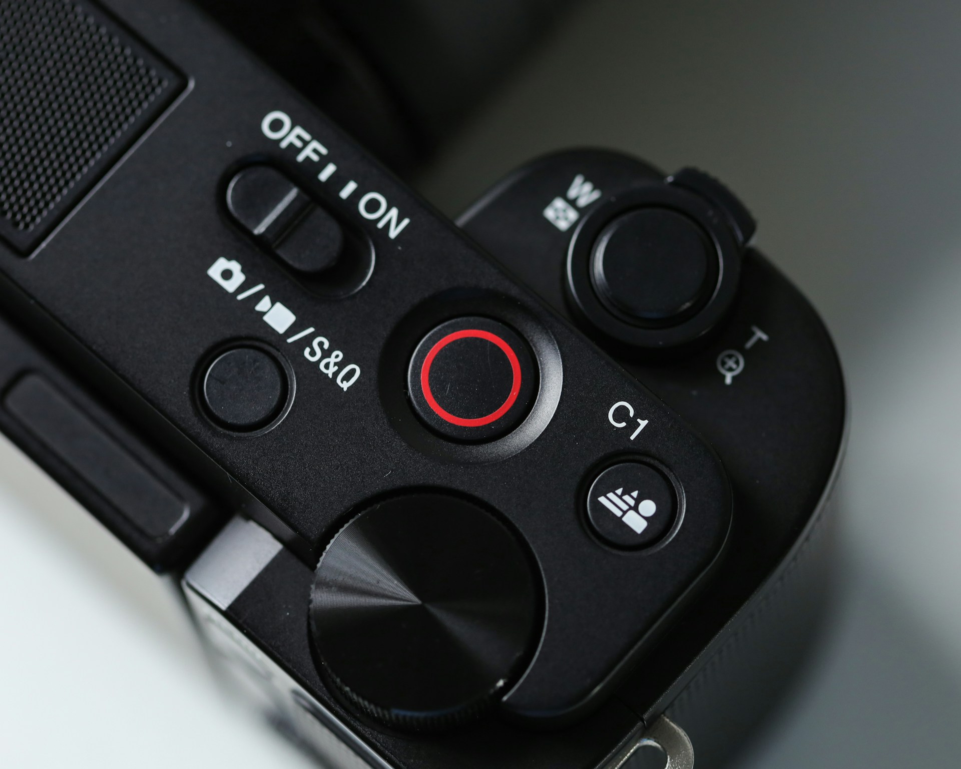 A close up of a camera with buttons on it