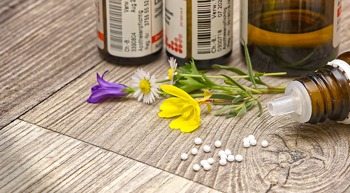 A small remedy bottle on a wooden table