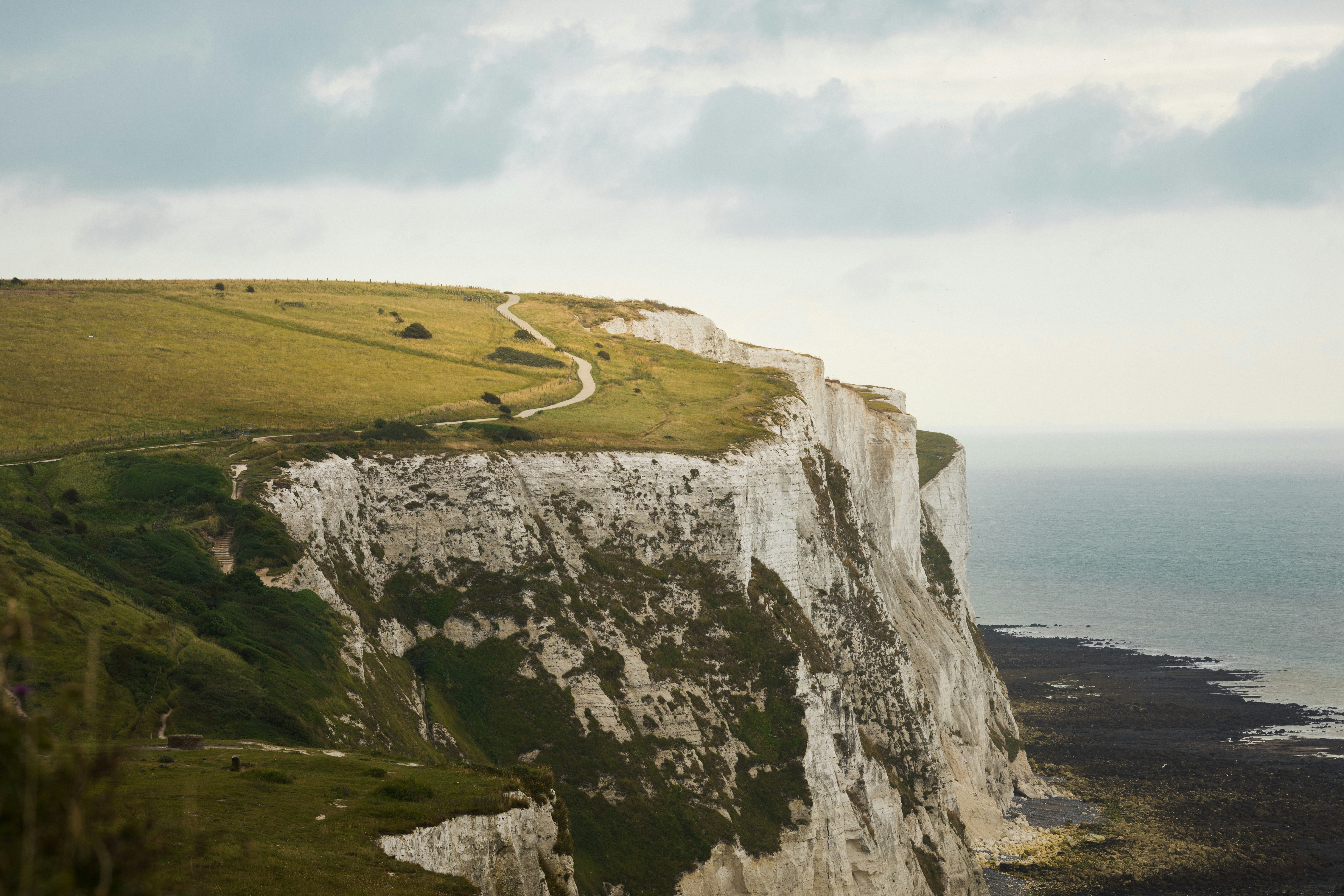 A view of a cliff overlooking the ocean