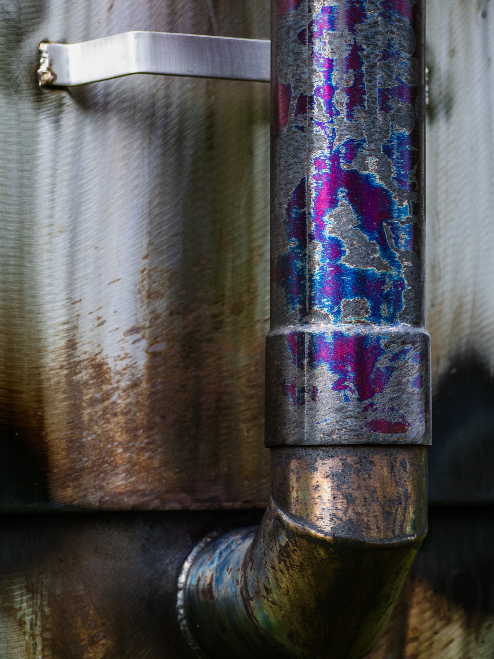 A close up of a pipe on a building