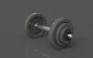 A pair of dumbbells on a gray background