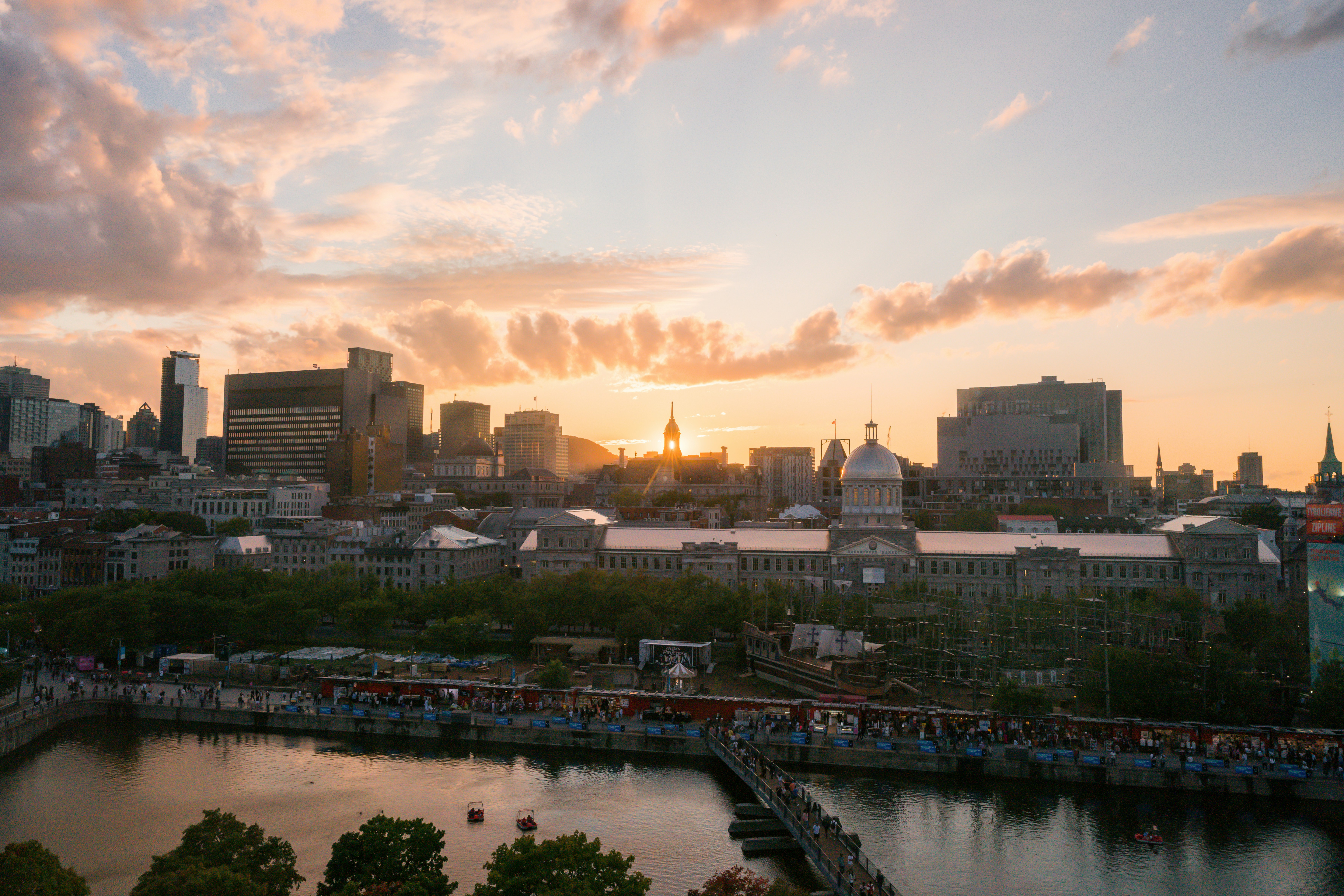 A view of a city at sunset from a high point of view