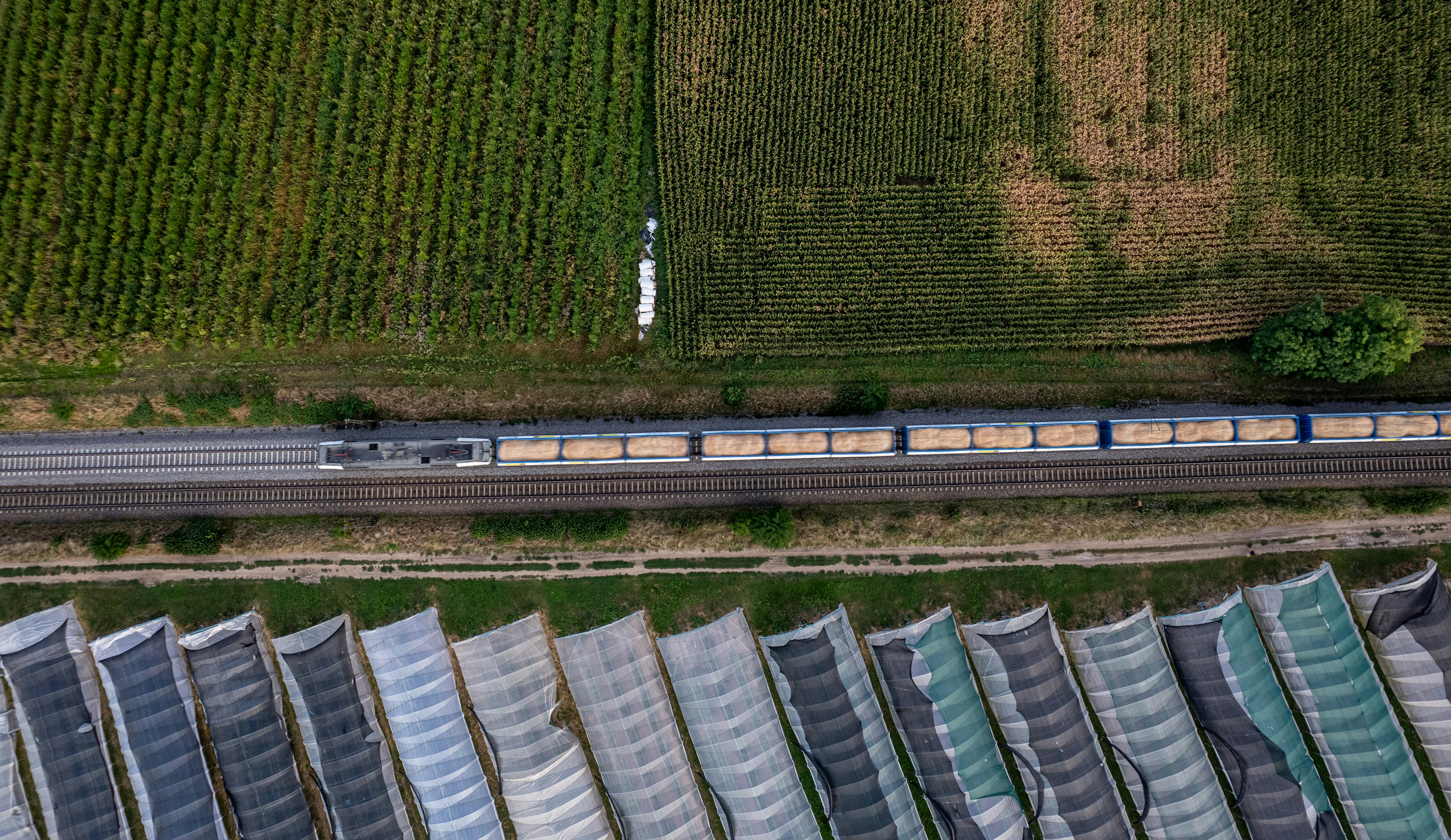 An aerial view of a train on a train track