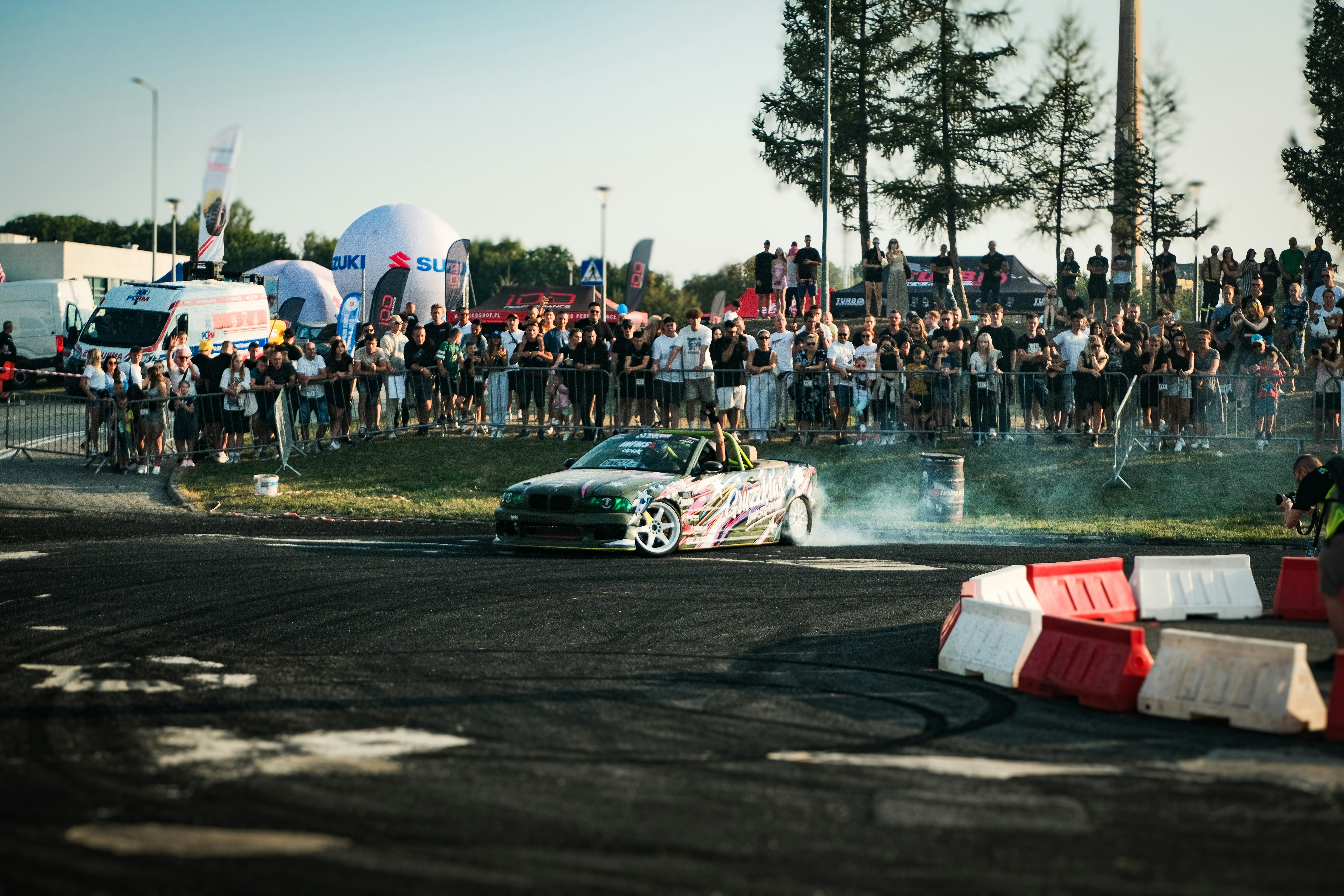 A car that is sitting in the street
