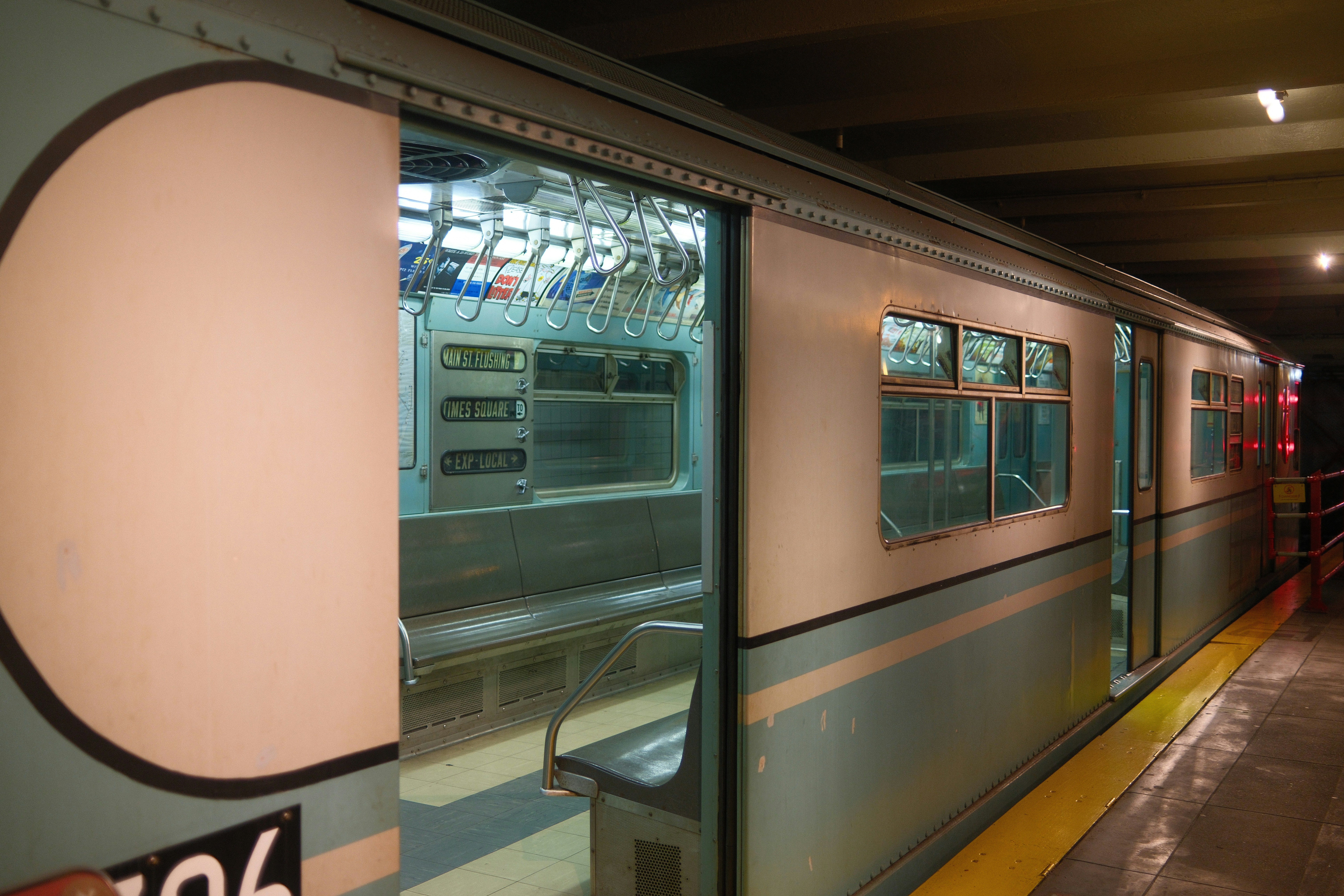 CTA Pink Line train at a Pilsen station - pilsen rentals