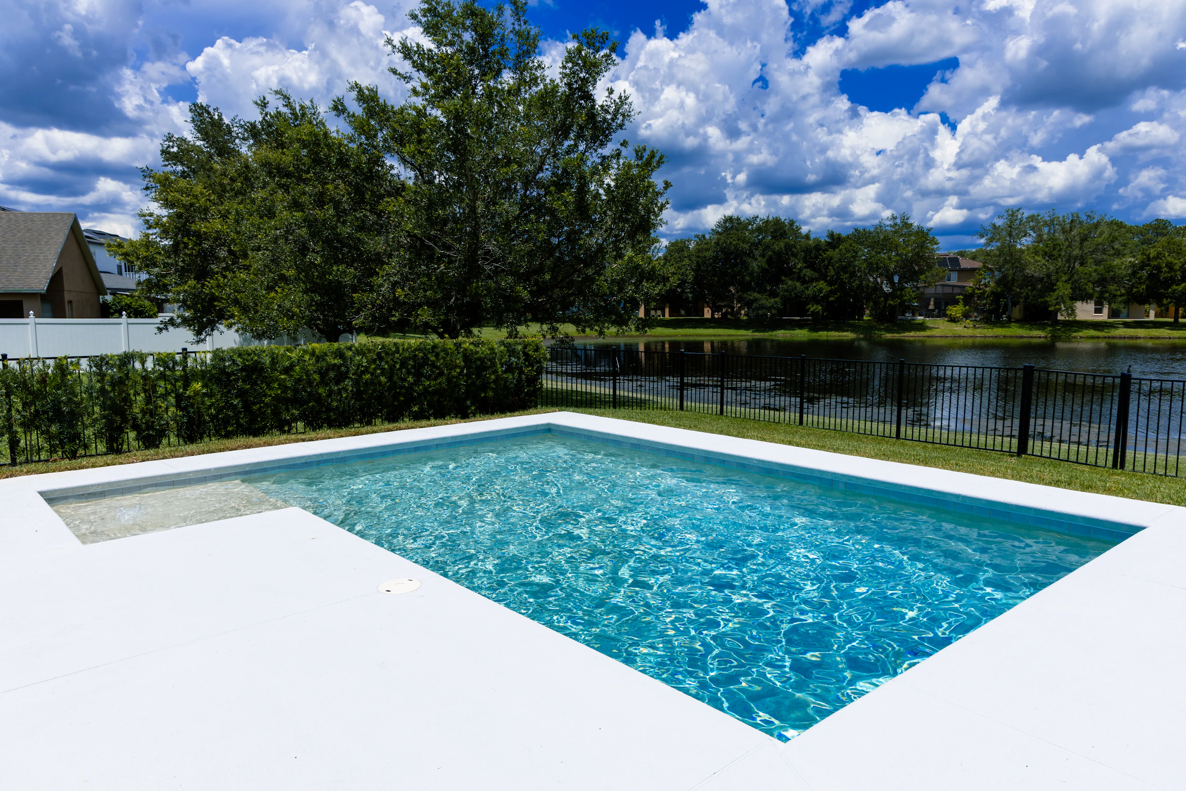 A residential pool and equipment pad