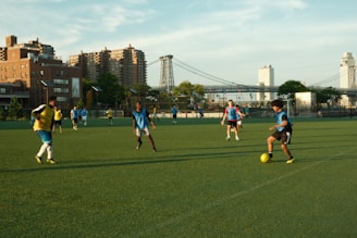 A group of young men playing a game of soccer