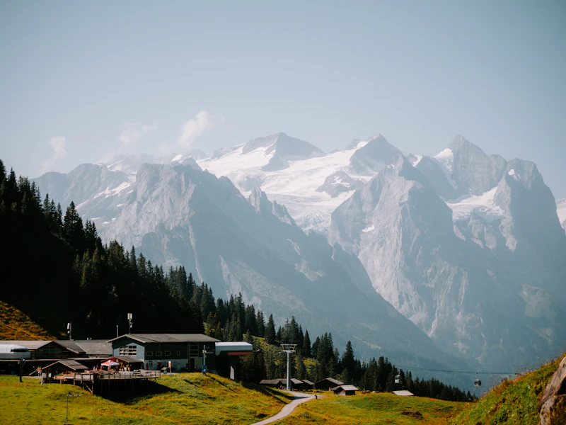 Sunlit alpine meadows and ridges of the kind seen from the Sunnegga terrace