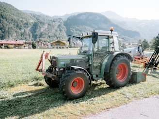 A tractor parked on the side of a road