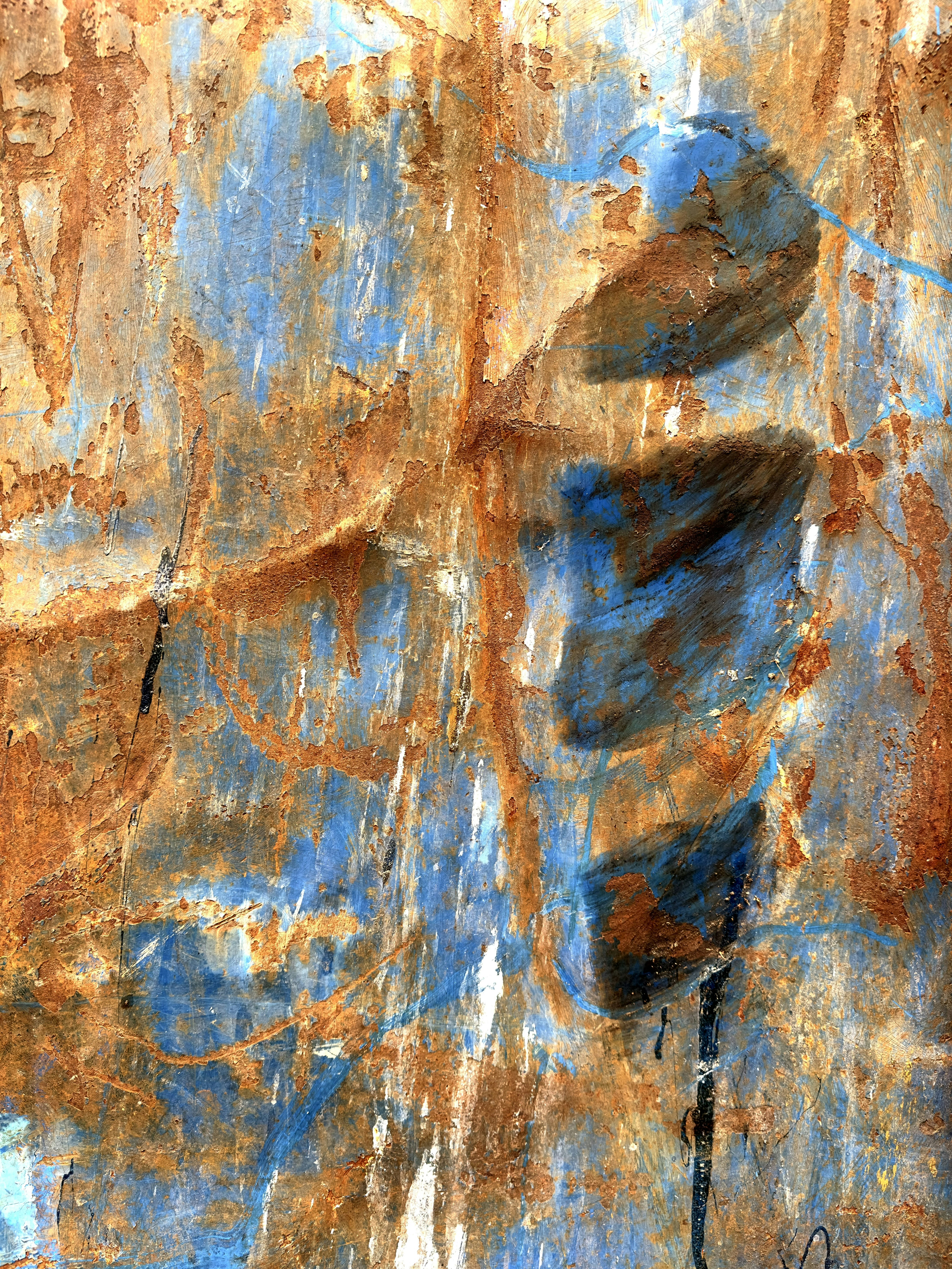 An abstract painting of blue and orange colors