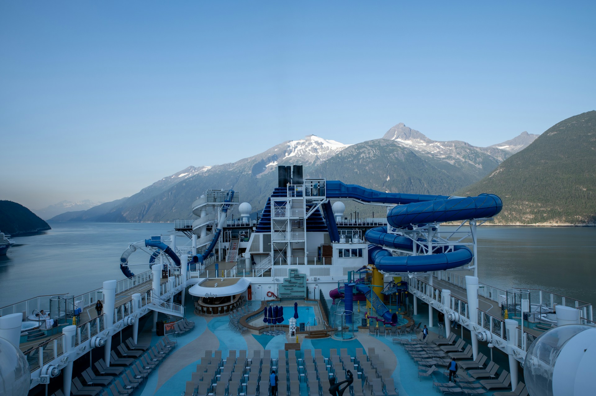 A water slide on a cruise ship in the water