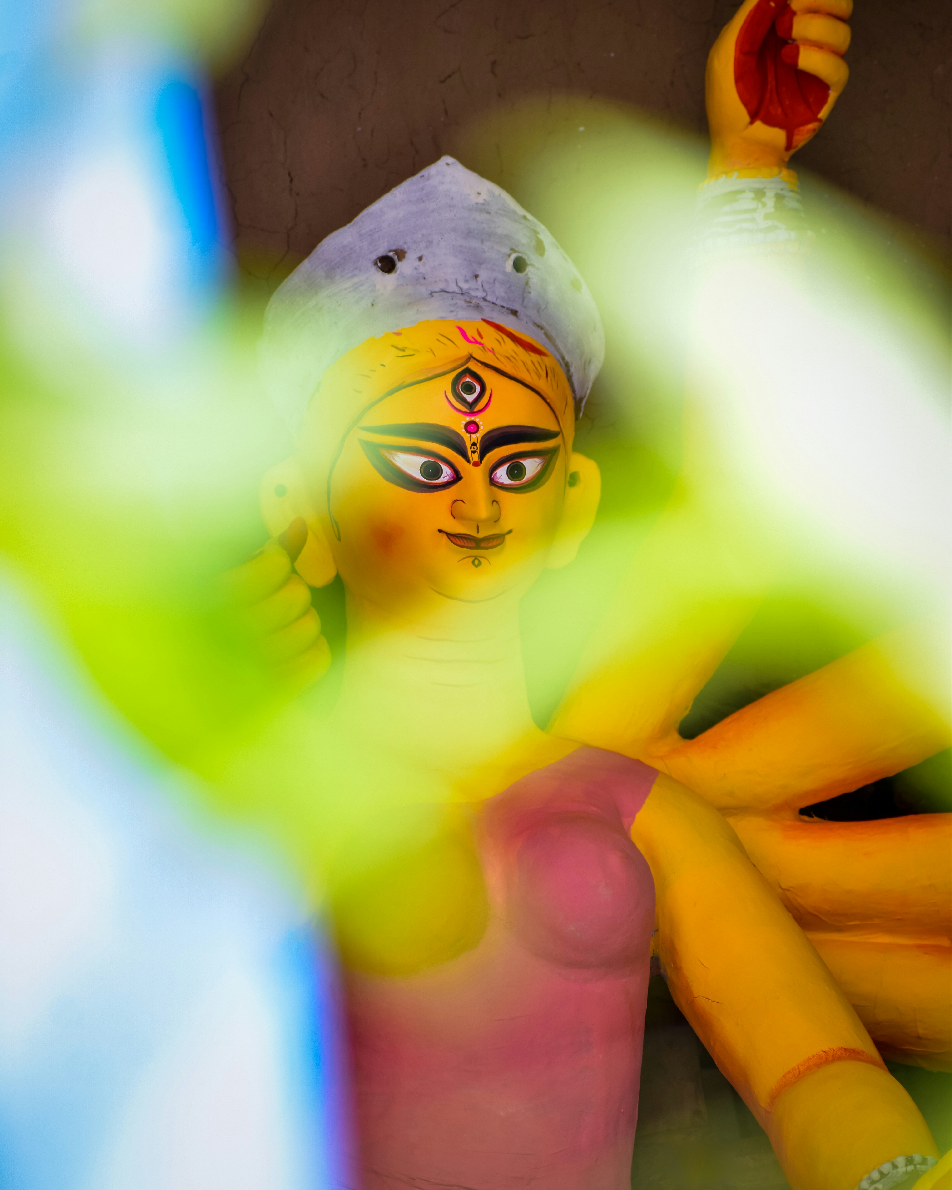 A statue of a person with a painted face