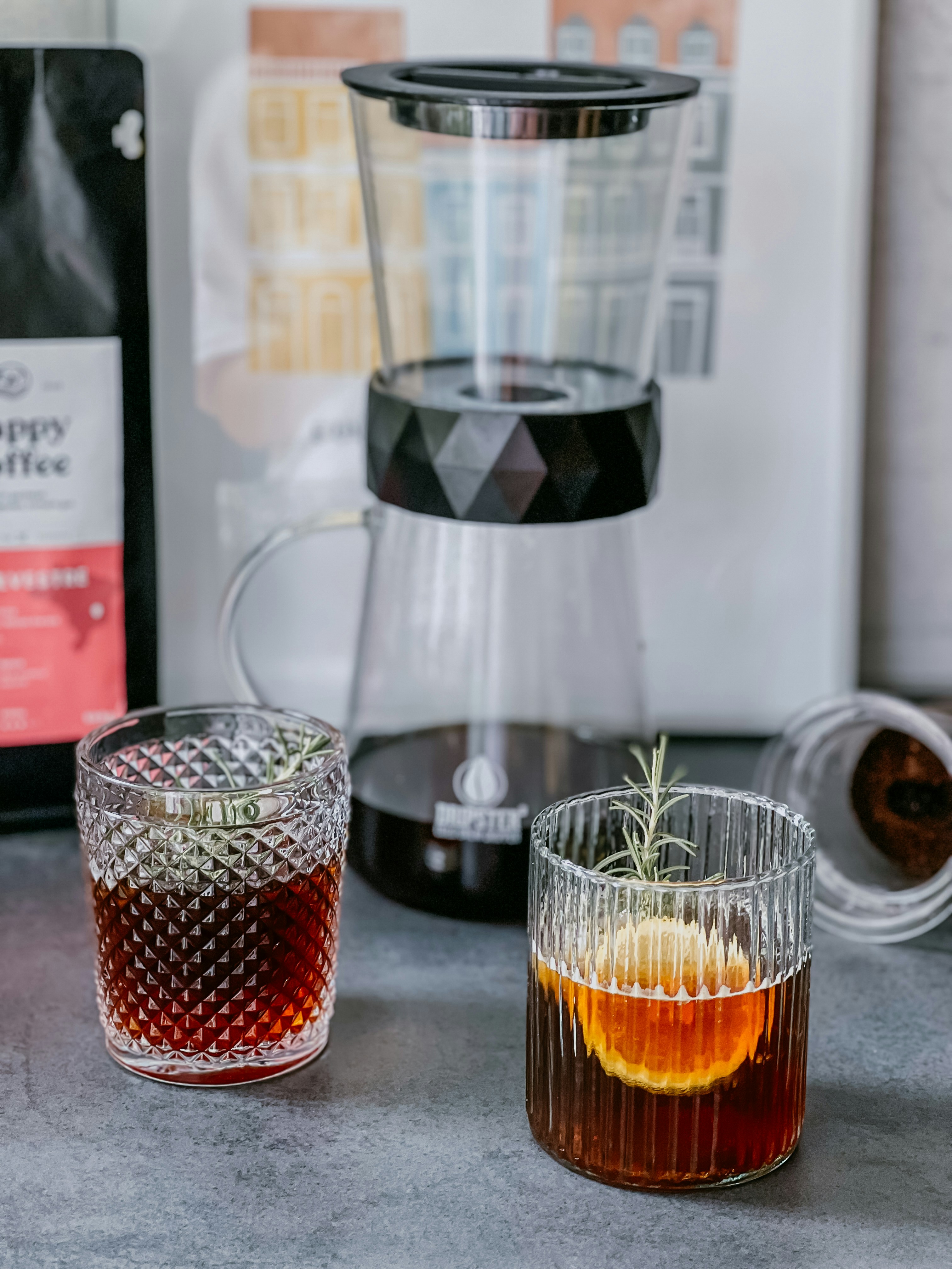 A couple of glasses sitting on top of a counter