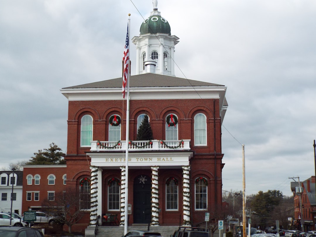 A large red brick building with a clock tower
