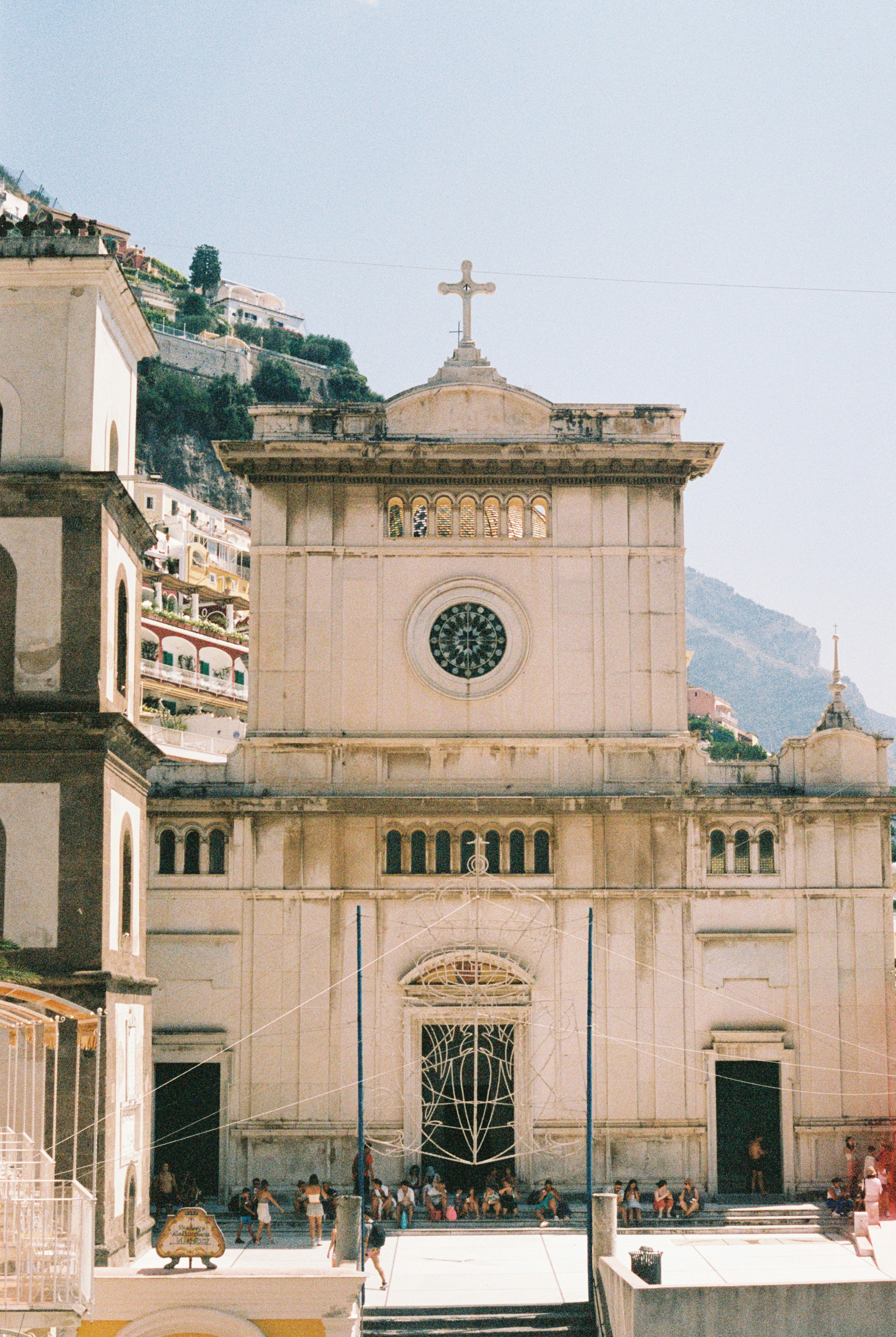 A church with a steeple and a clock on it