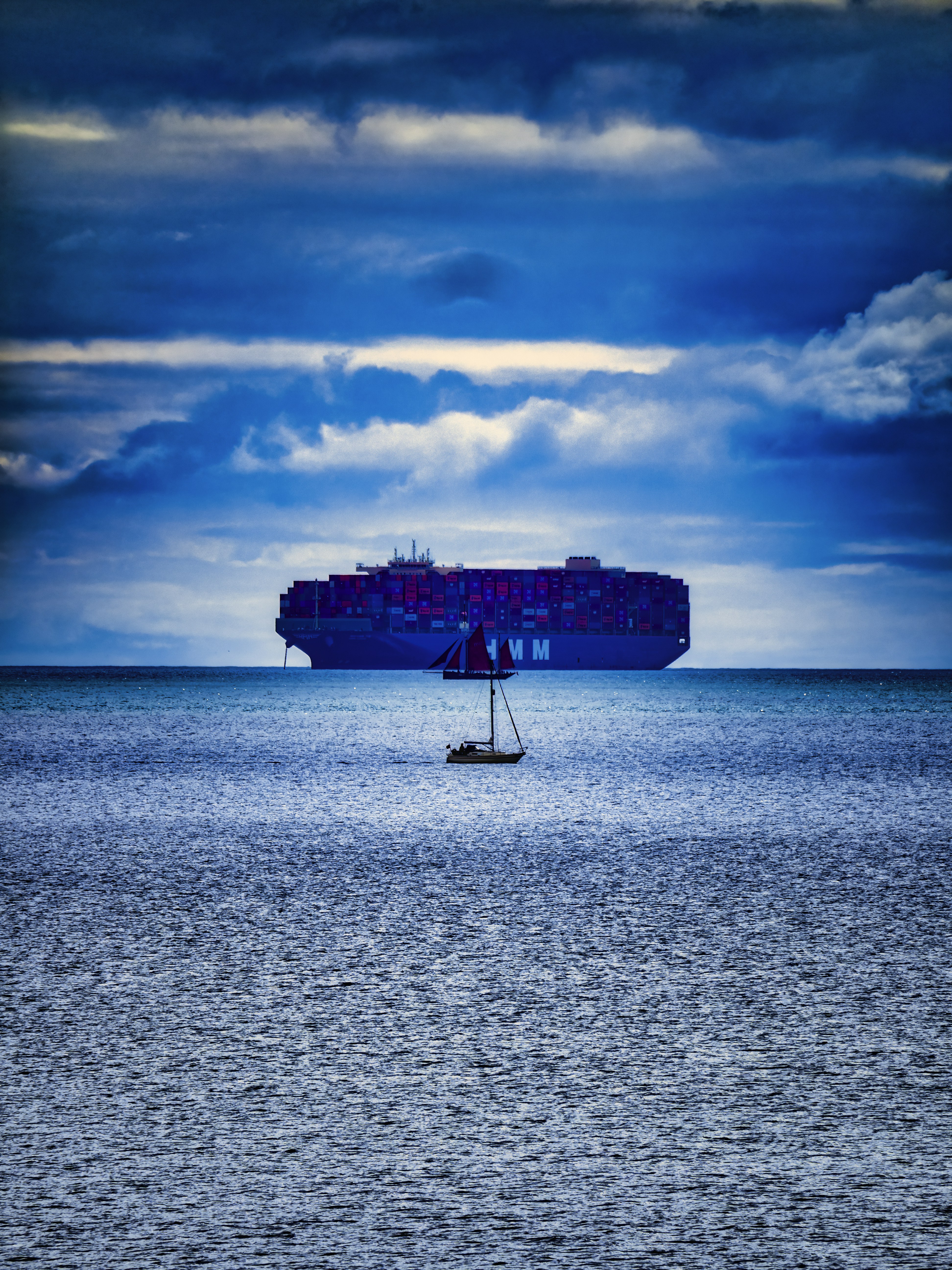 A large container ship in the middle of the ocean